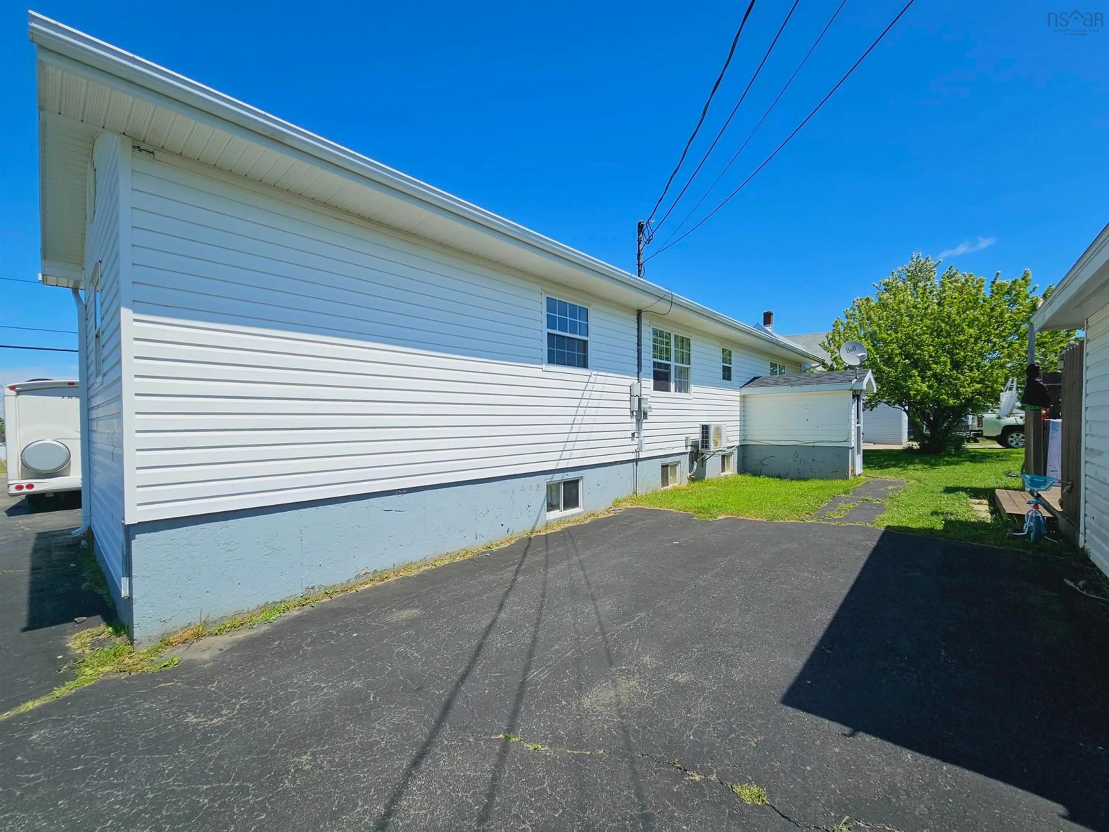 Frontside or backside of a home, the front or back of building for 101 Butts St, Sydney Mines Nova Scotia B1V 1N5