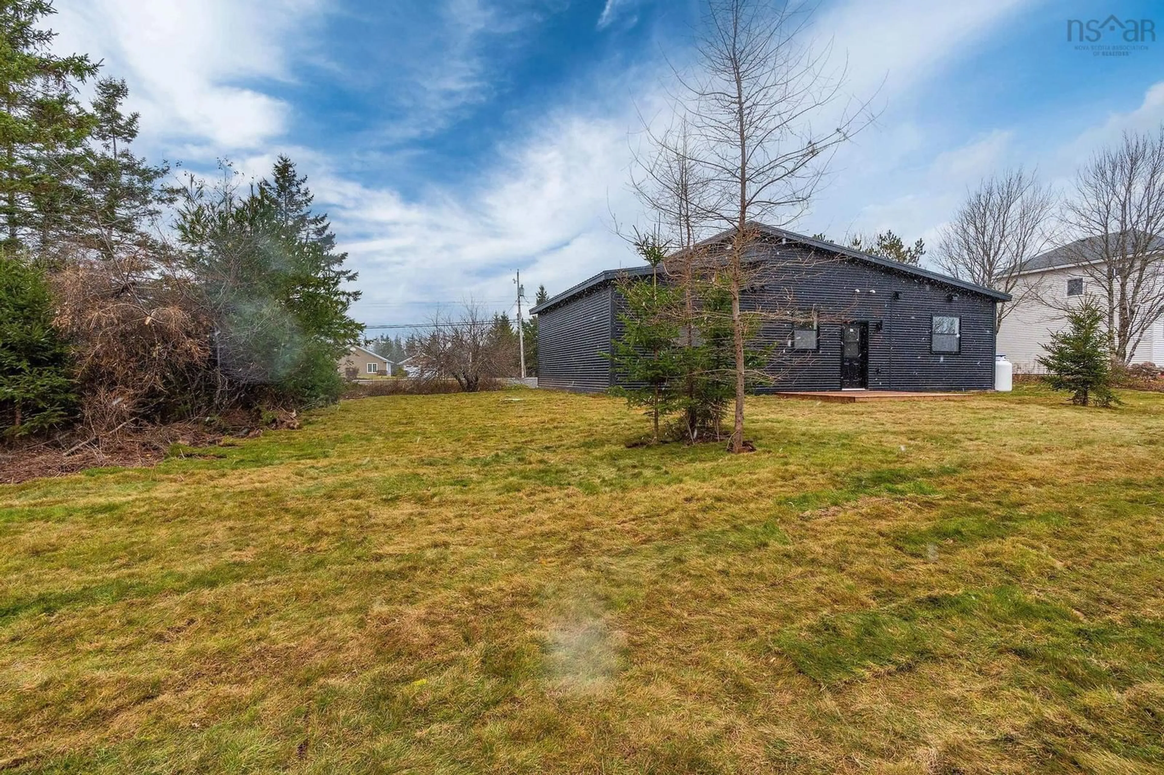 Frontside or backside of a home, the fenced backyard for 192 Harmony Ridge Rd, Harmony Nova Scotia B6L 3N9