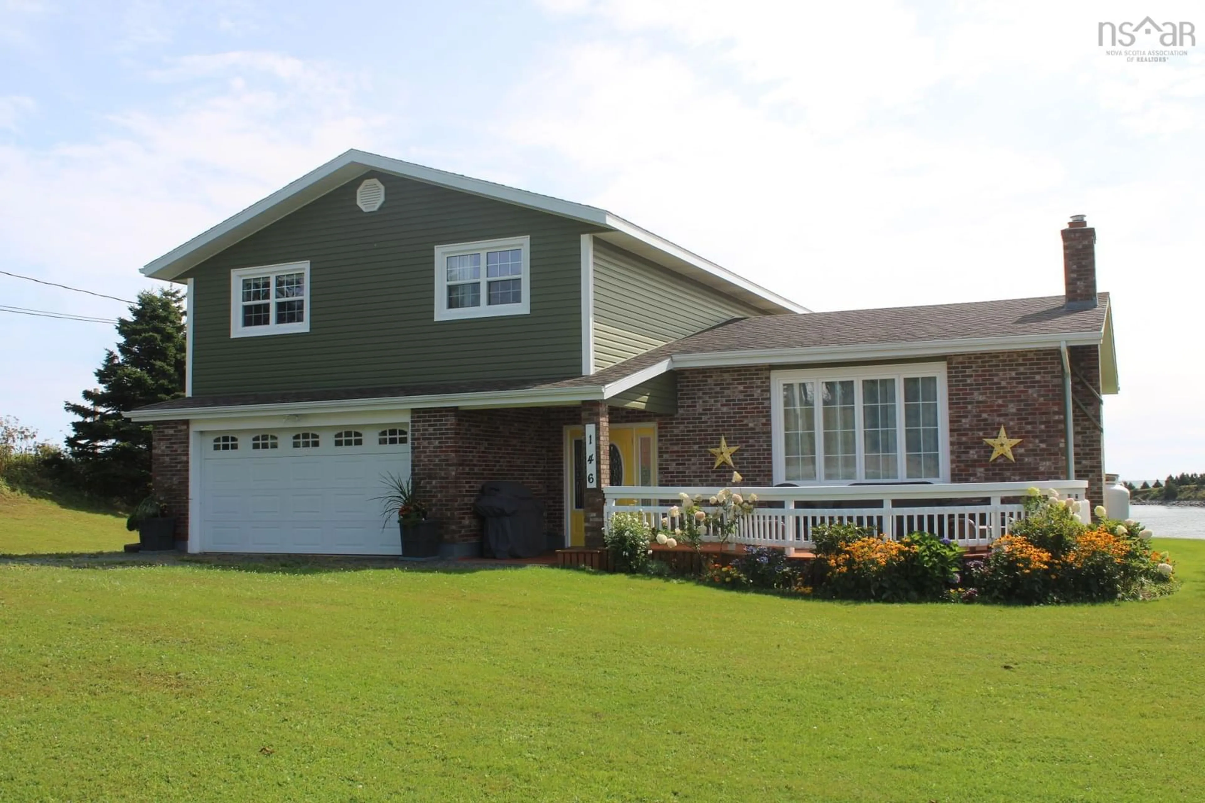 Frontside or backside of a home, cottage for 146 Chapel Cove Rd, L'Ardoise Nova Scotia B0E 3B0