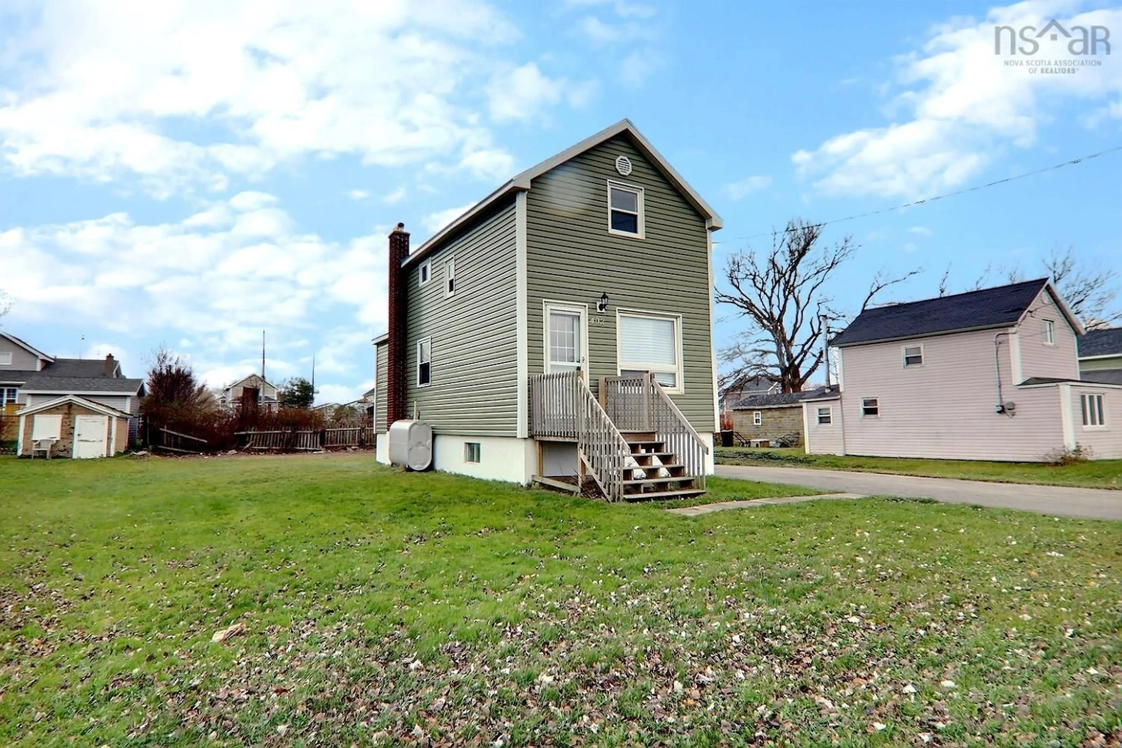 Frontside or backside of a home, cottage for 402 King Street, New Waterford Nova Scotia B1H 3Y4