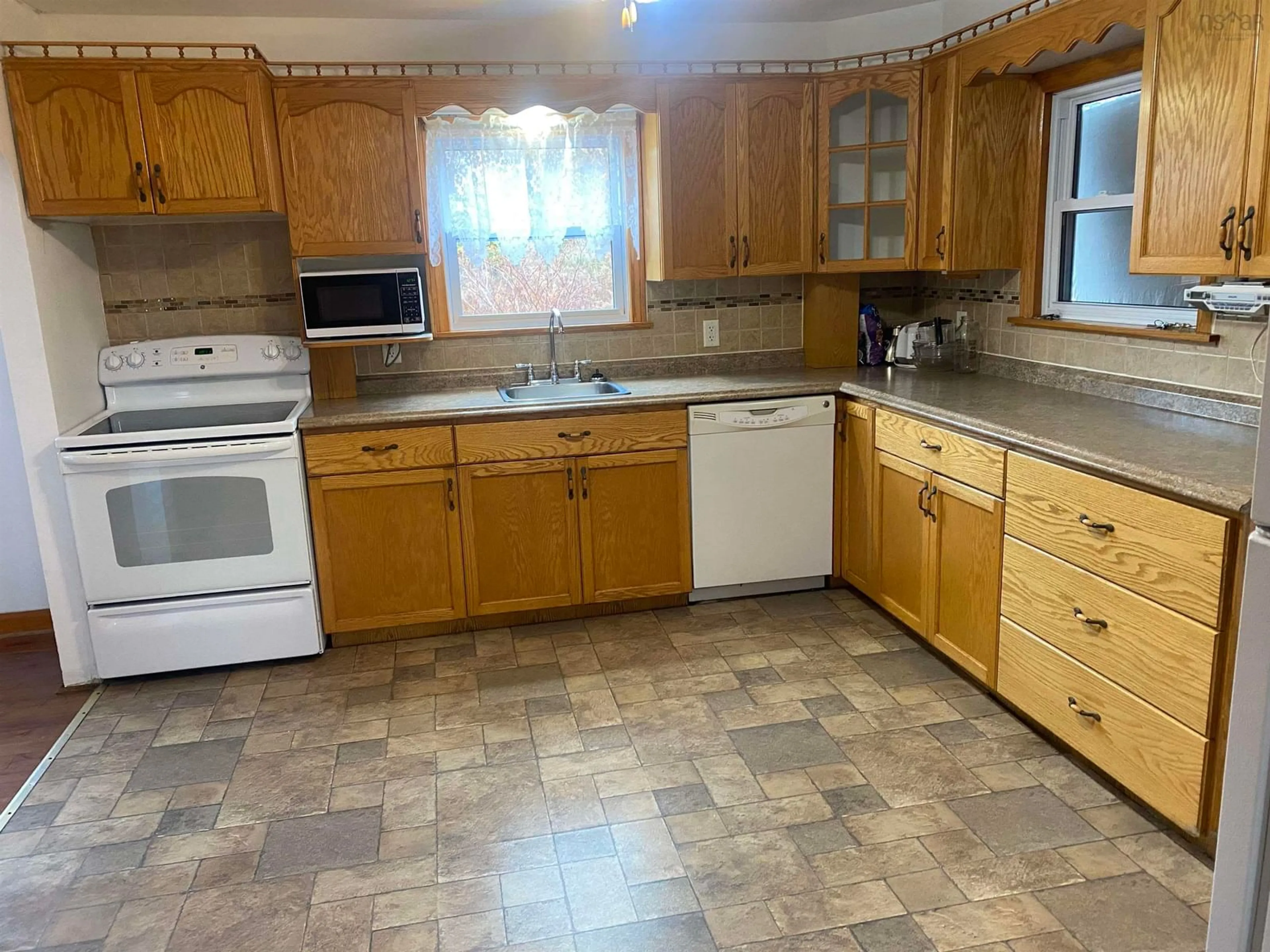 Kitchen, wood floors, cottage for 91 Forrest Street, Sydney Mines Nova Scotia B1V 2B4