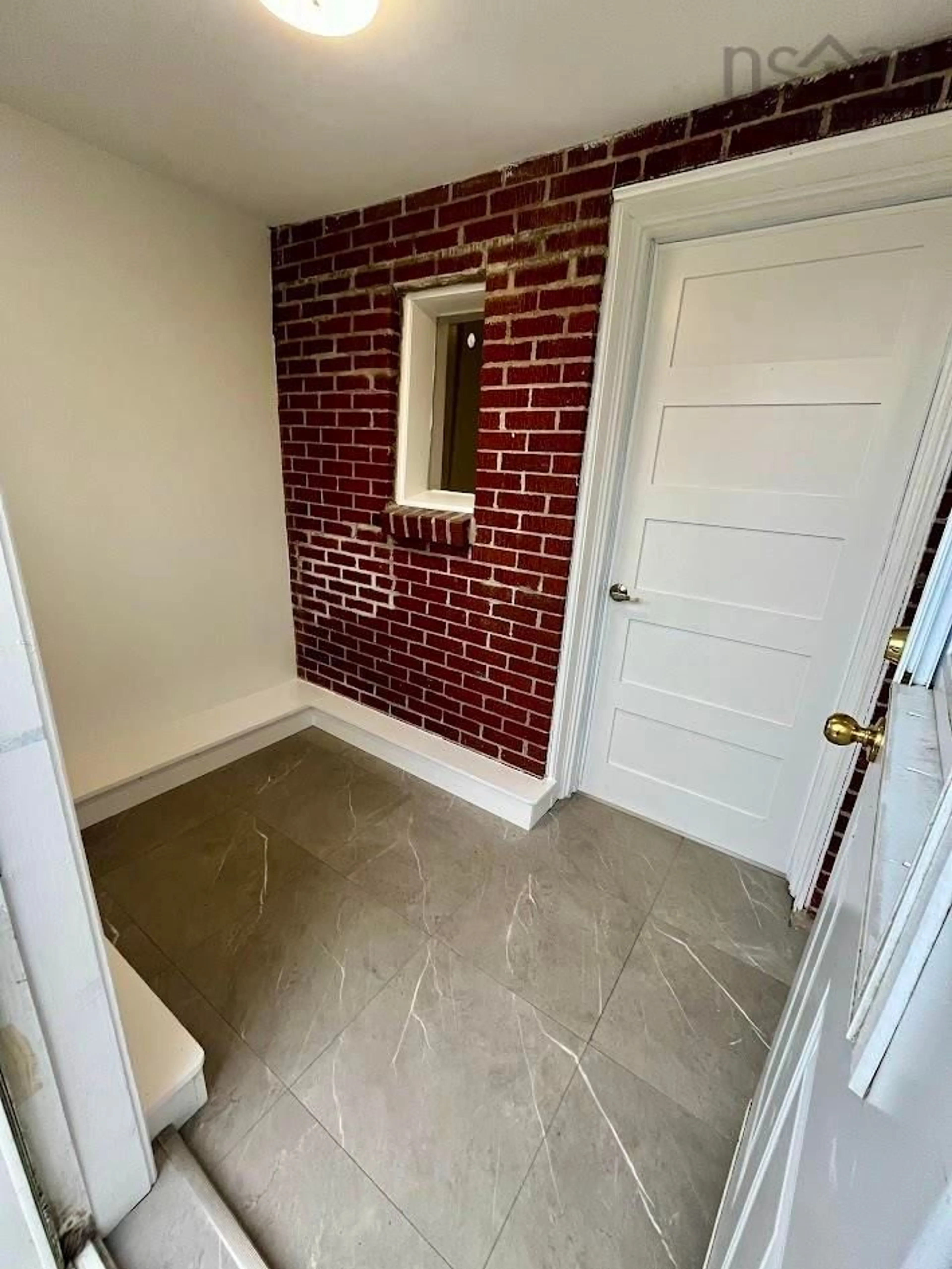 Indoor entryway, cement floor for 80 & 82 Fenwick St, Dartmouth Nova Scotia B2Y 2J6