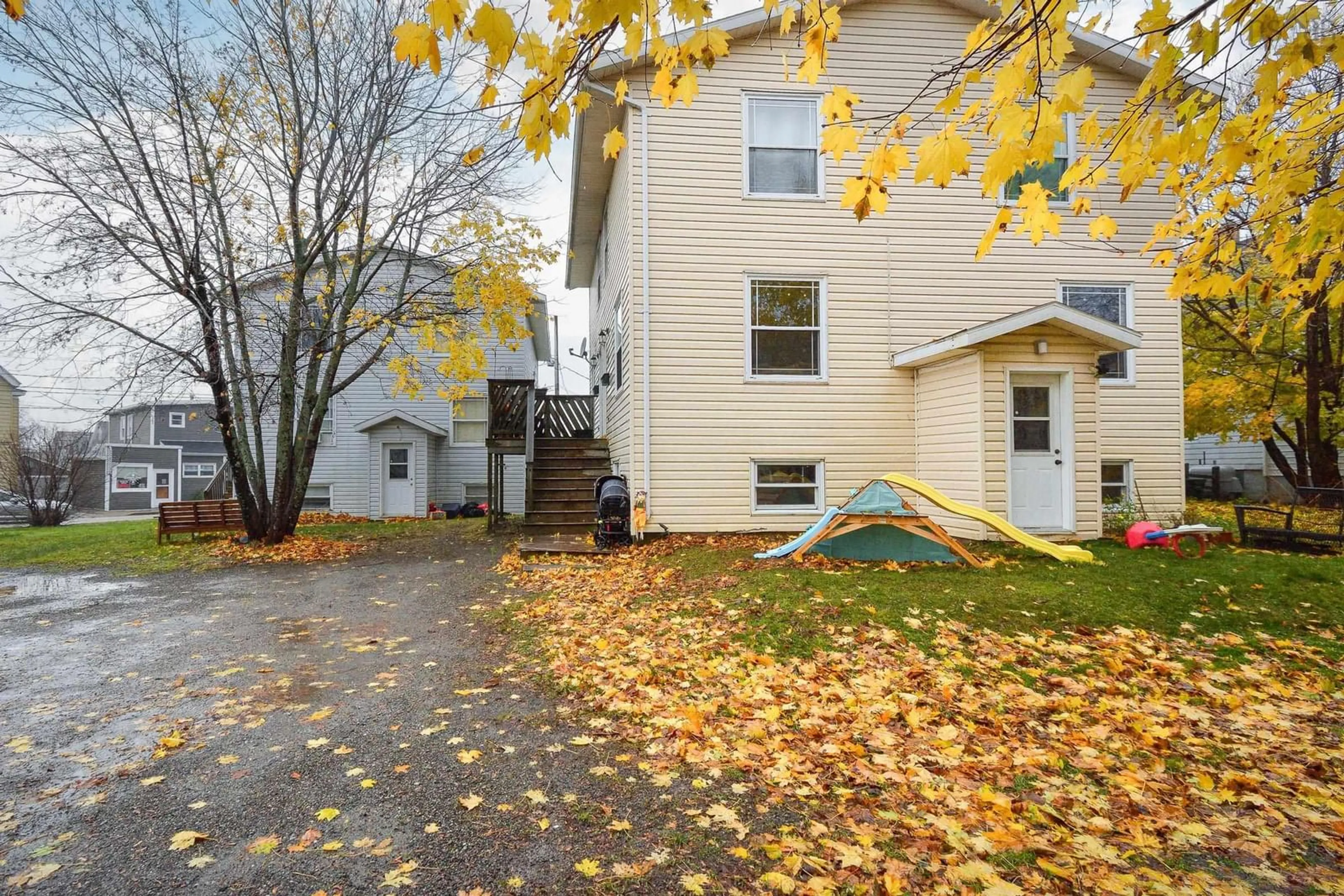 A pic from exterior of the house or condo, the fenced backyard for 322 Townsend St, Sydney Nova Scotia B1P 5G2