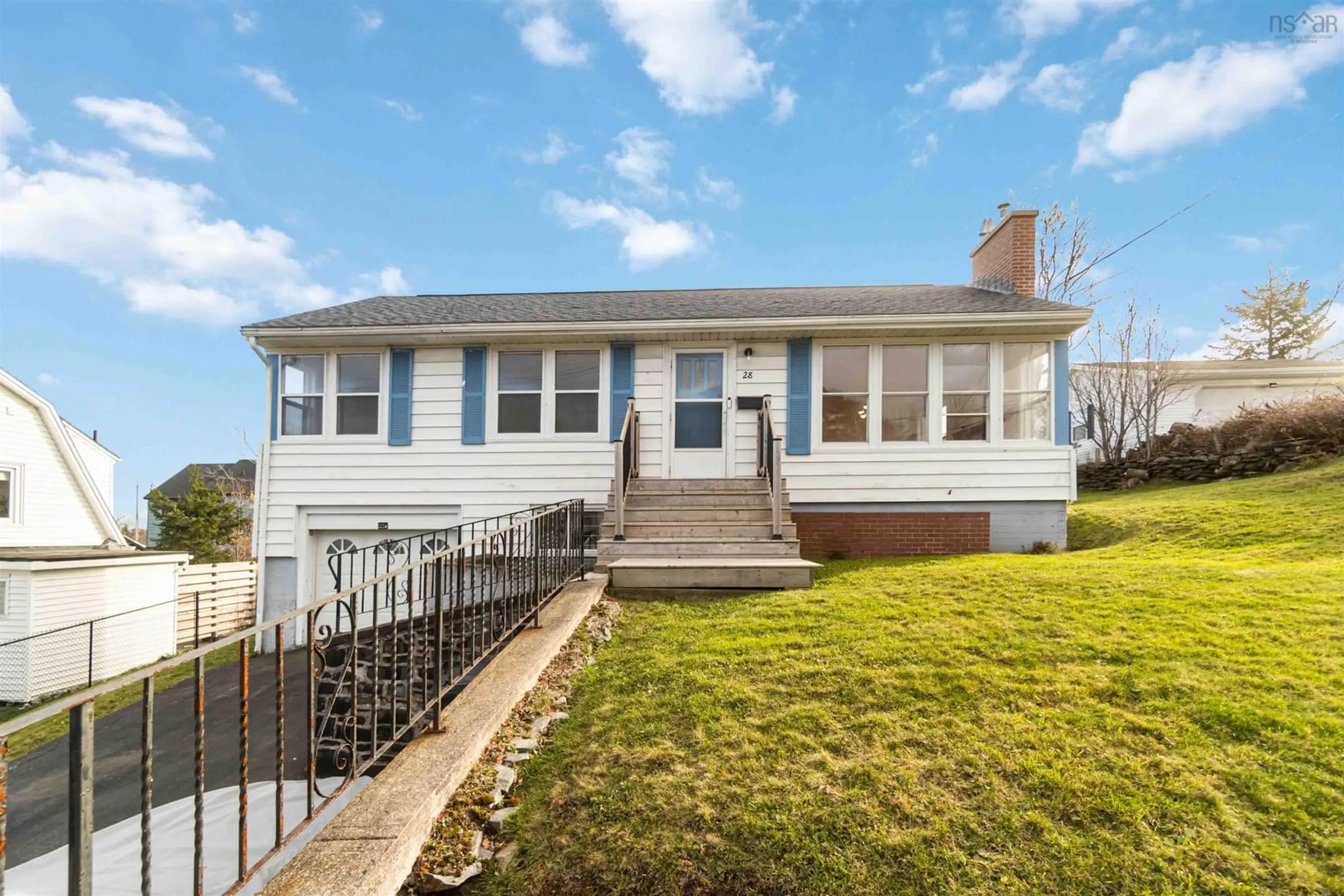 Frontside or backside of a home, the fenced backyard for 28 Arlington Ave, Halifax Nova Scotia B3N 1Z8