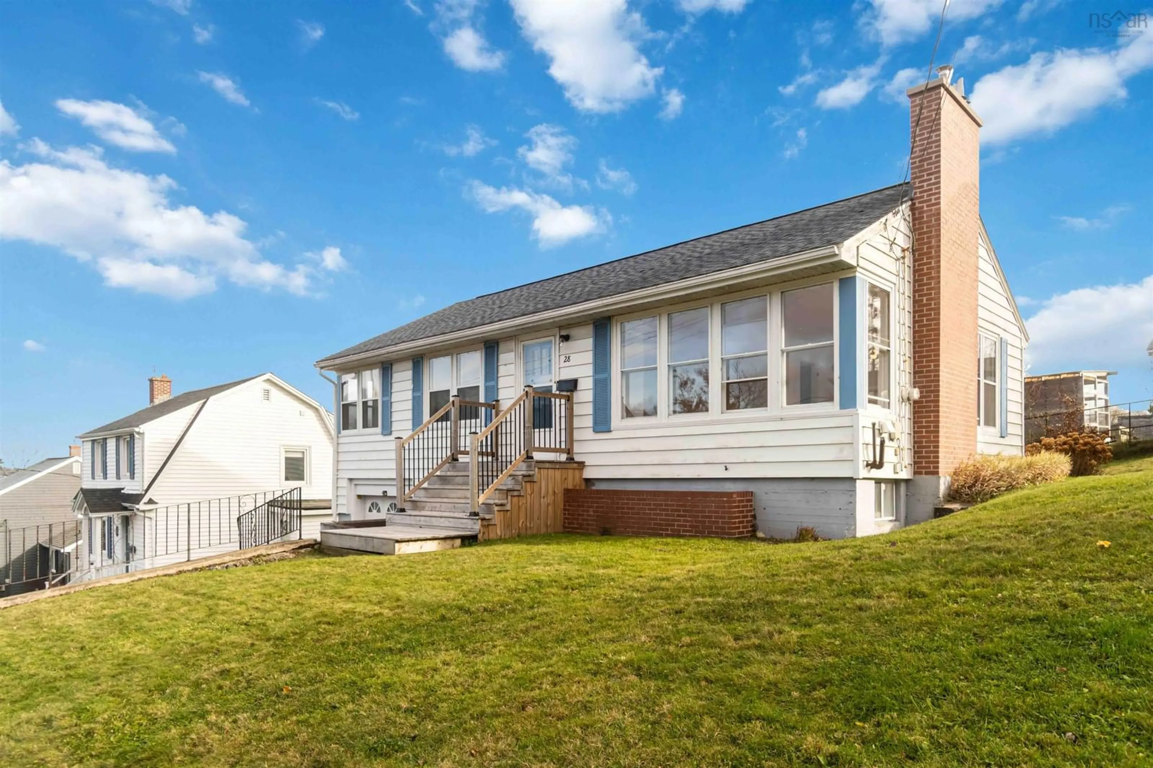 Frontside or backside of a home, the fenced backyard for 28 Arlington Ave, Halifax Nova Scotia B3N 1Z8