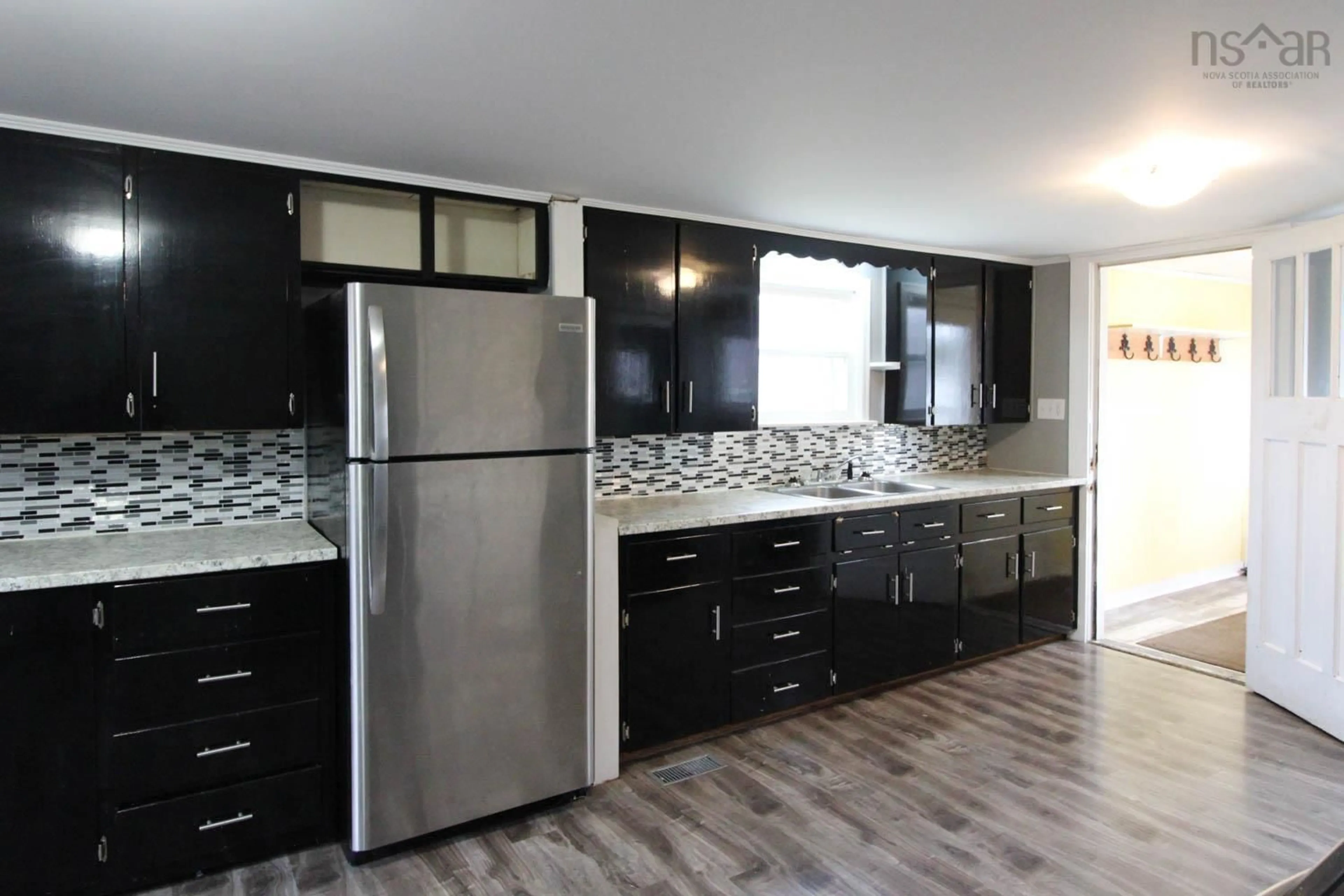 Open concept kitchen for 415 Highway 2, Brookfield Nova Scotia B0N 1C0