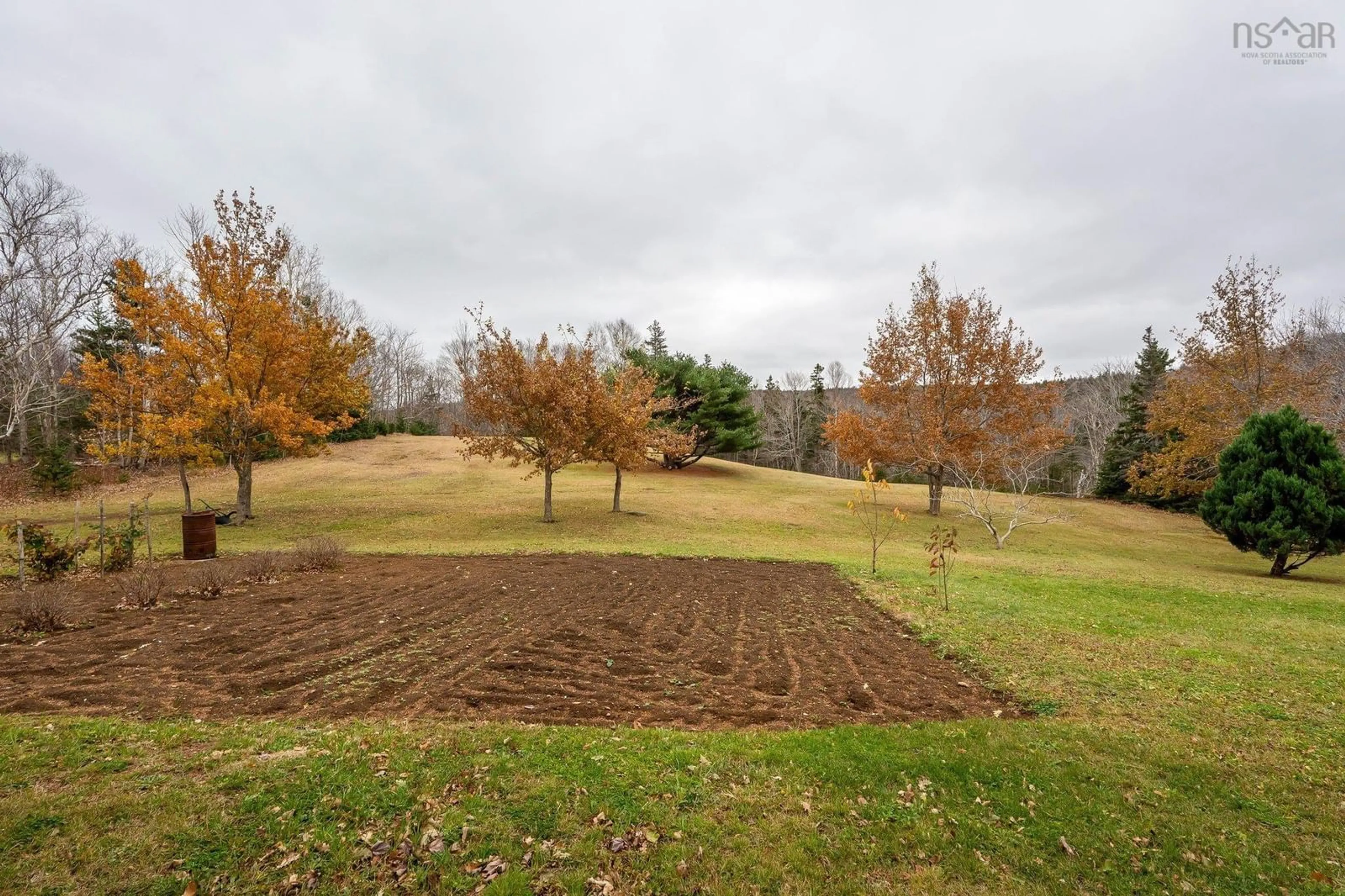 Patio, the fenced backyard for 2436 Shore Rd, Delaps Cove Nova Scotia B0S 1A0