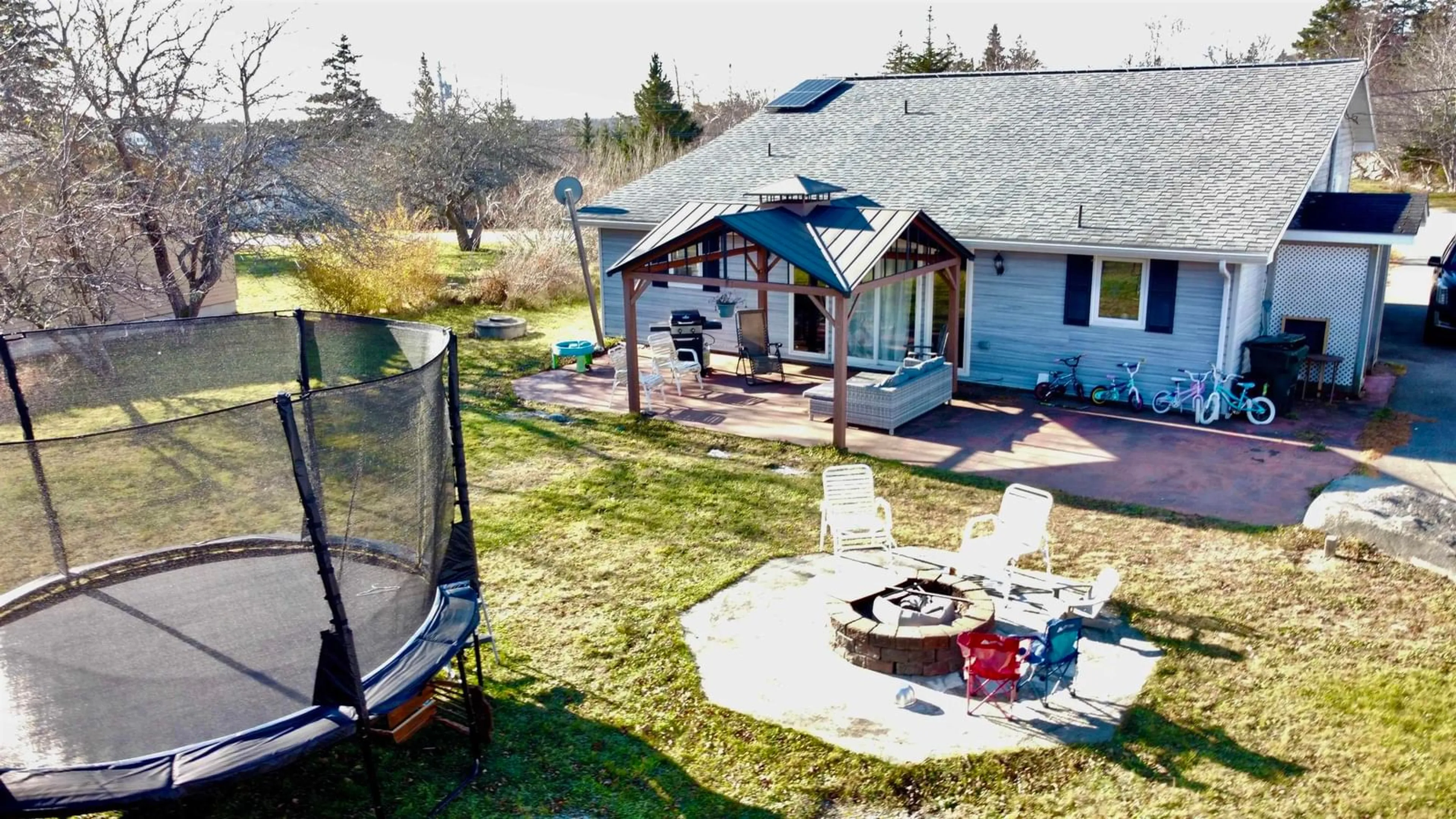 Patio, the fenced backyard for 55 Bayside Dr, Brass Hill Nova Scotia B0W 1E0