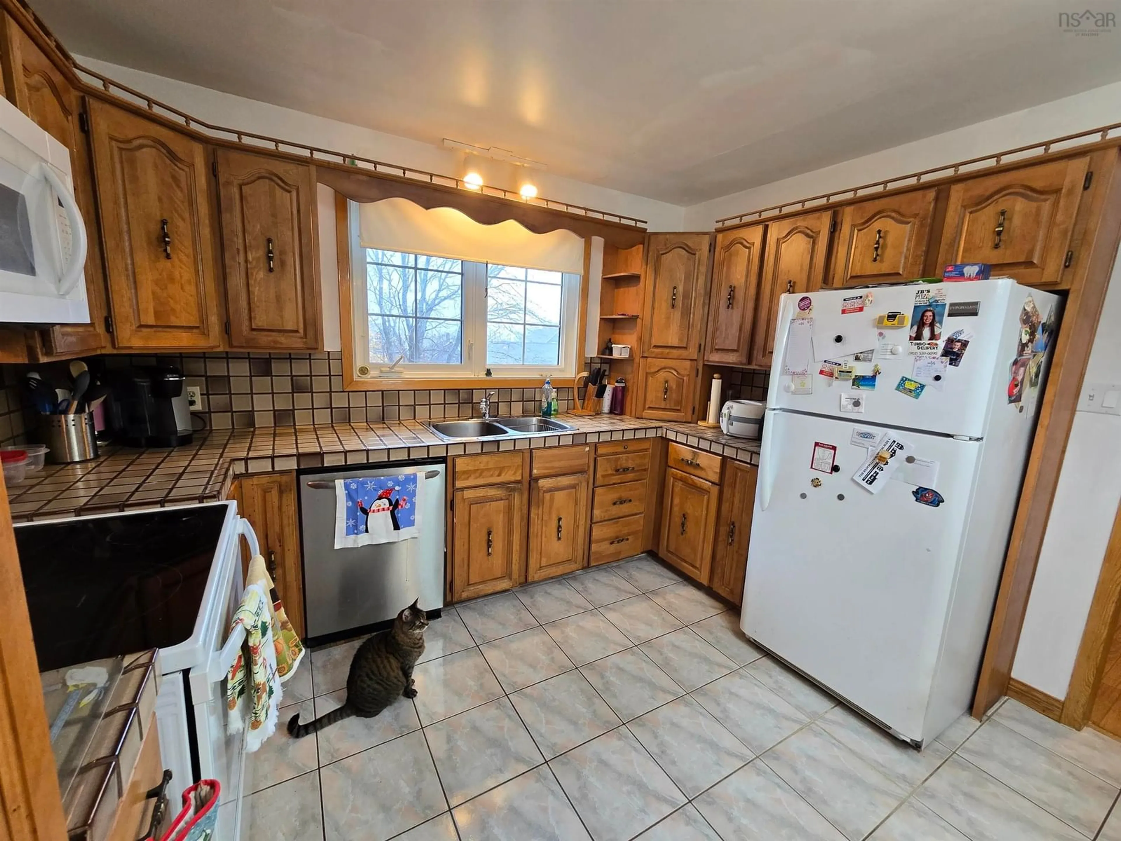 Kitchen, wood floors, cottage for 308 Lisgard St, Sydney Nova Scotia B1P 2Y9