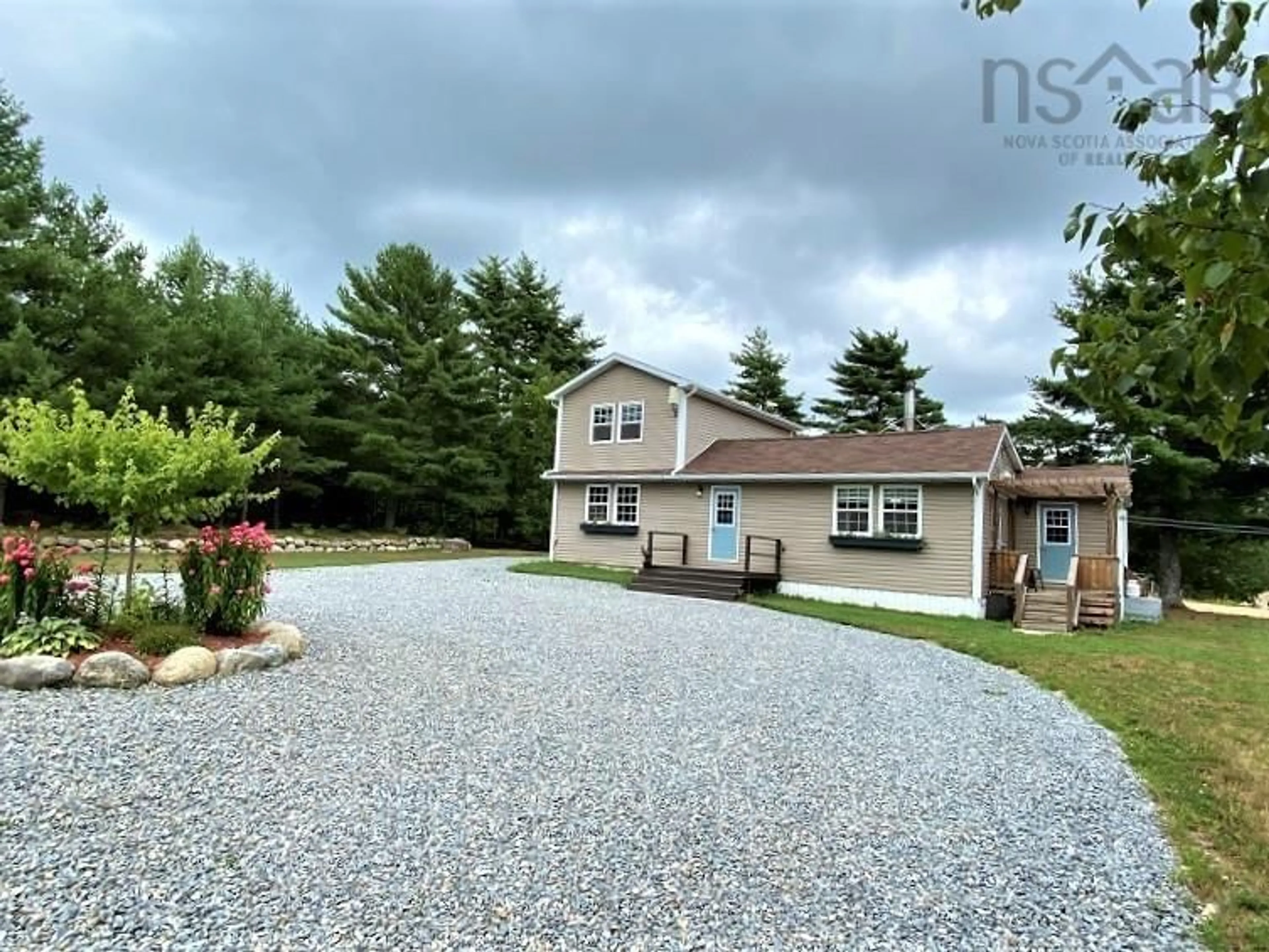 Frontside or backside of a home, the street view for 198 Happy Valley Lane, Lower Clyde River Nova Scotia B0W 1R0