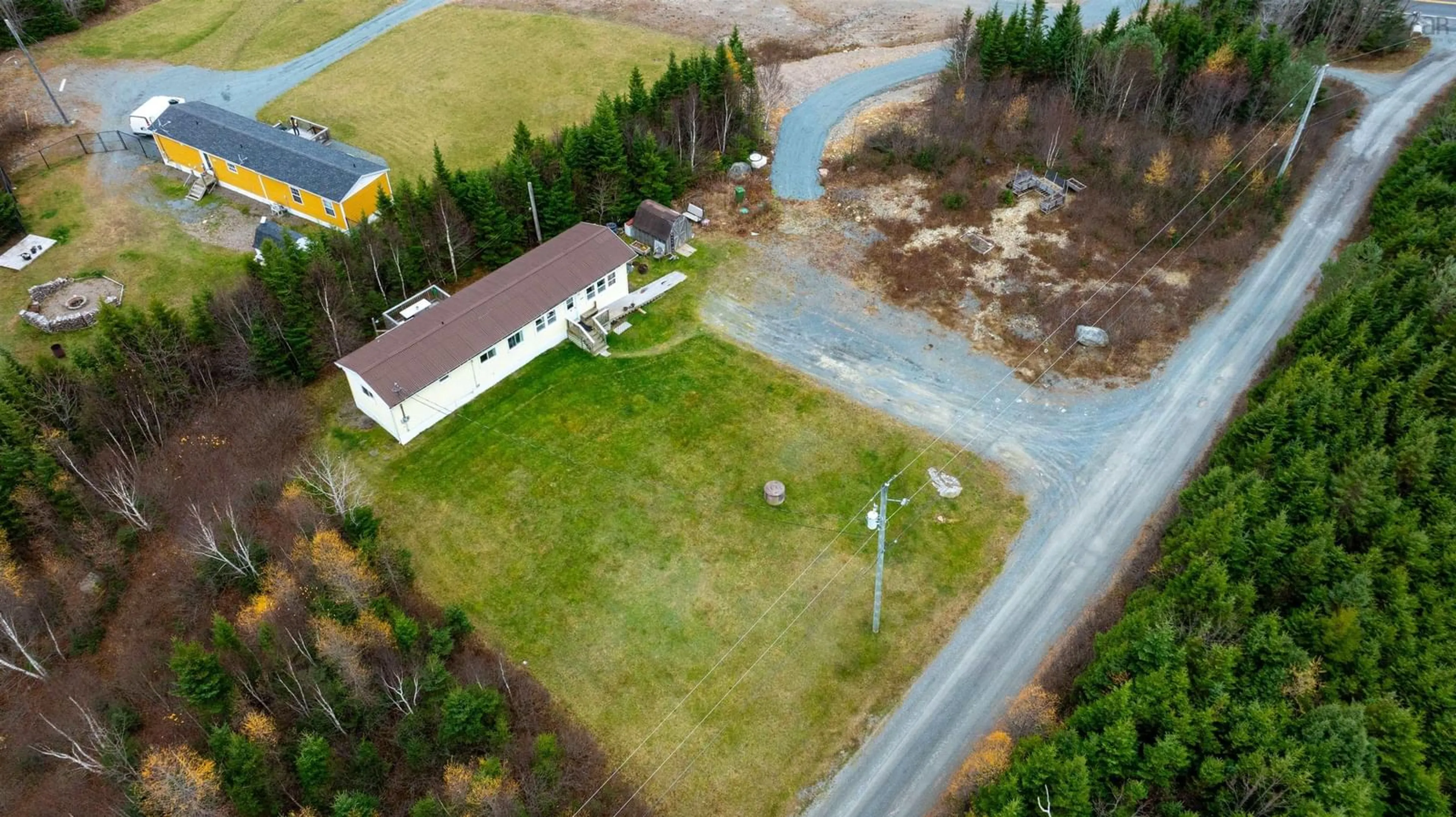 Frontside or backside of a home, the fenced backyard for 9645 Highway 7 Hwy, Jeddore Nova Scotia B0J 1P0