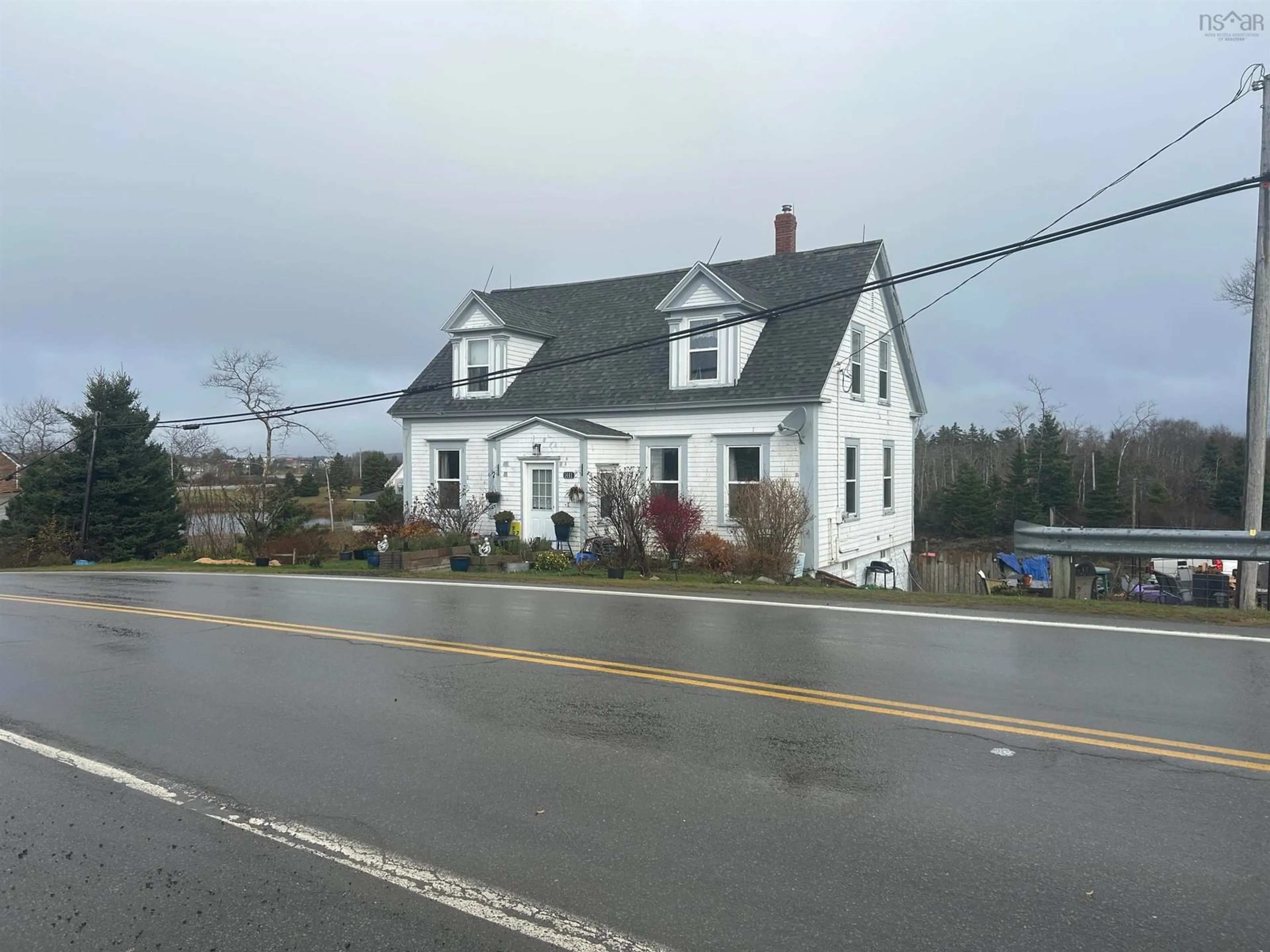 Frontside or backside of a home, the street view for 1461 206 Hwy, West Arichat Nova Scotia B0E 3J0