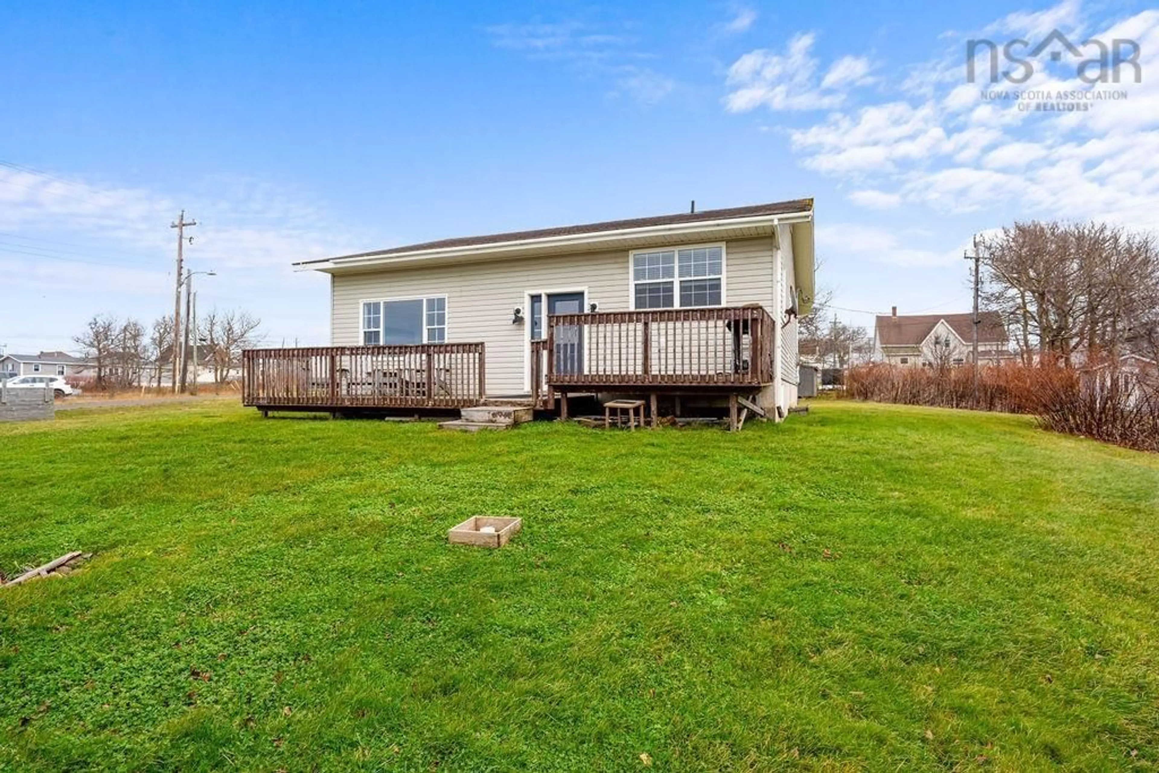 A pic from exterior of the house or condo, the fenced backyard for 9 Mine Rd, Inverness Nova Scotia B0E 1N0