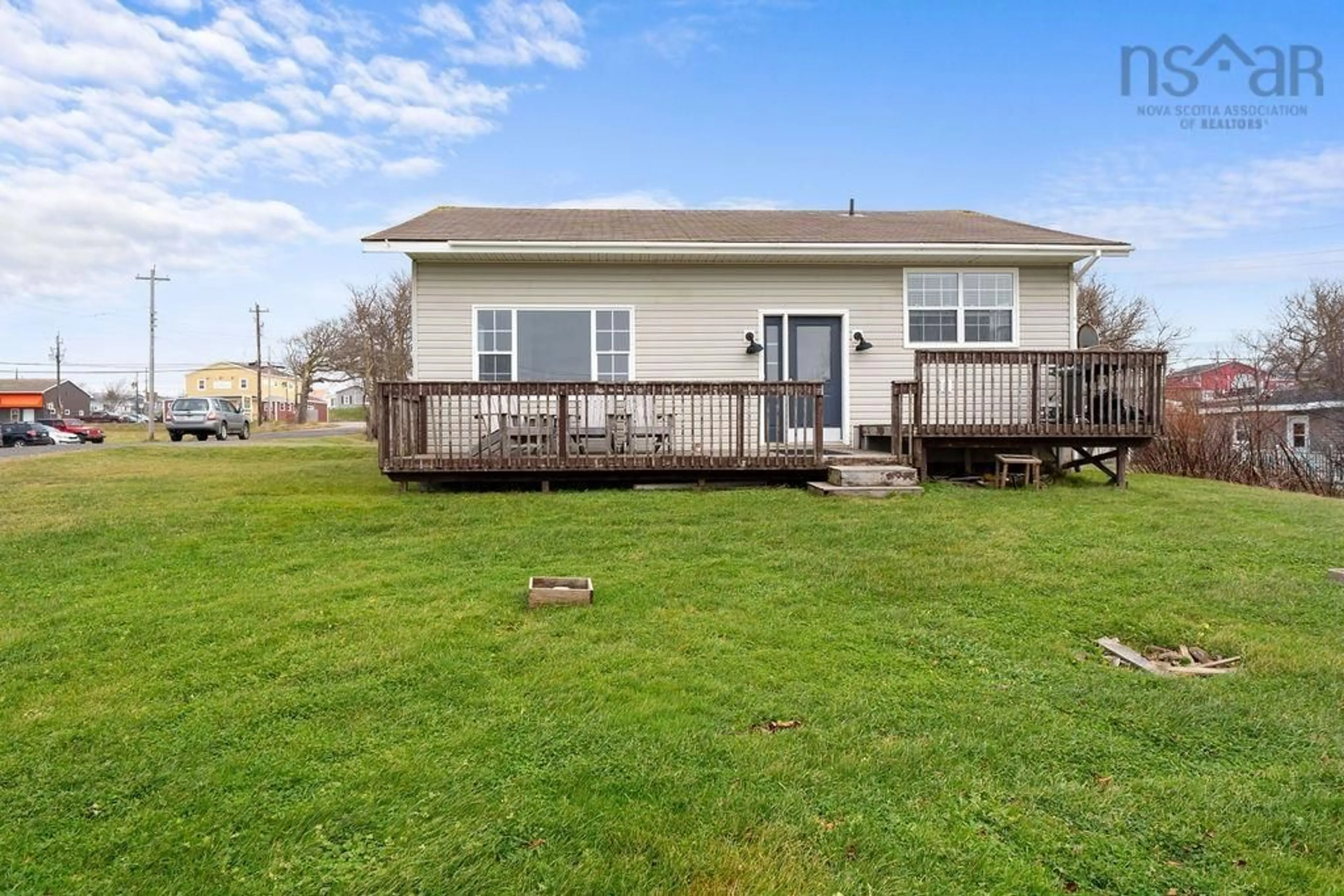 Frontside or backside of a home, the fenced backyard for 9 Mine Rd, Inverness Nova Scotia B0E 1N0