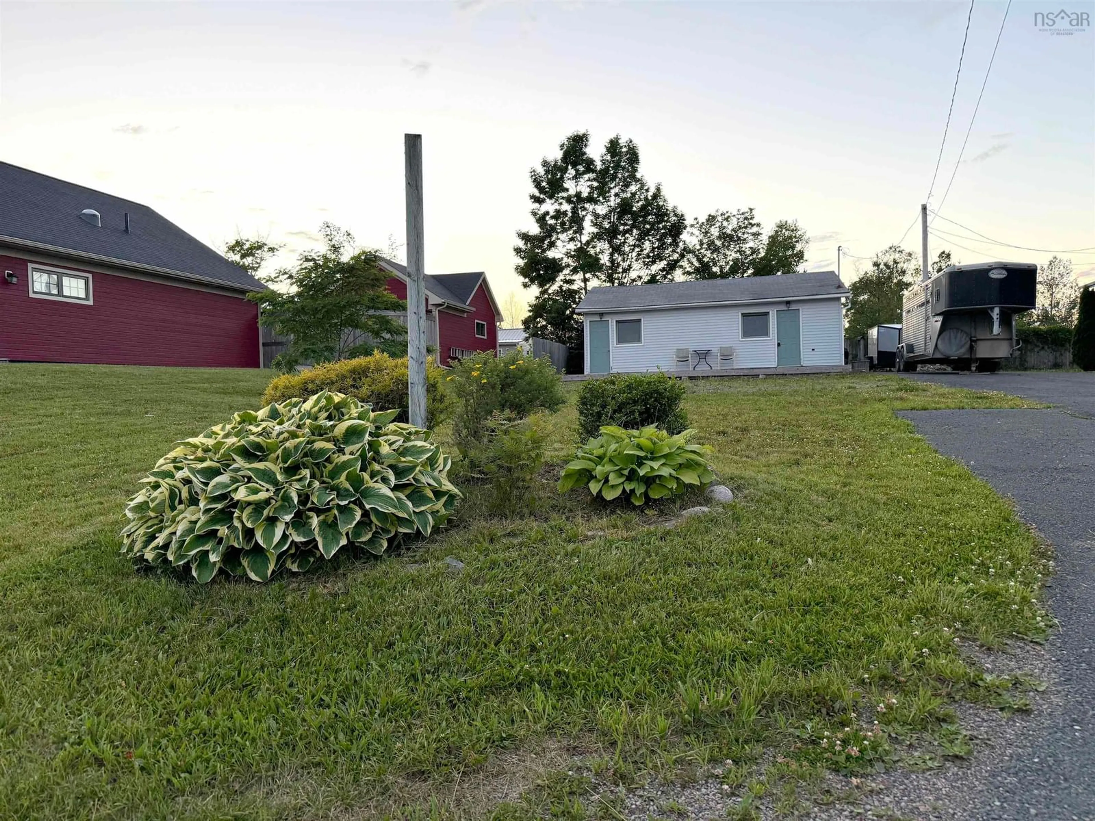 Frontside or backside of a home, cottage for 18 High St, Baddeck Nova Scotia B0E 1B0