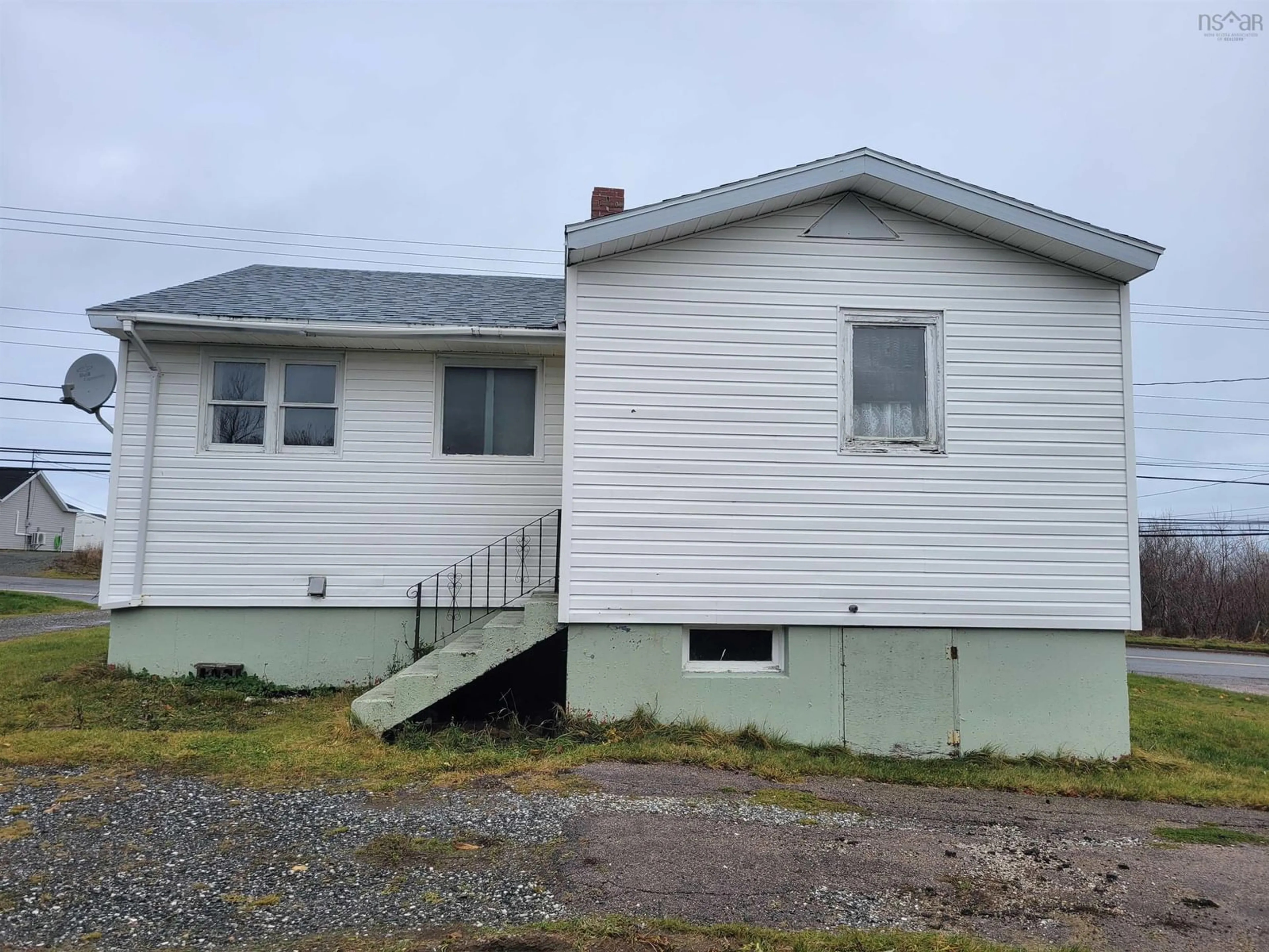 Frontside or backside of a home, the front or back of building for 935 Main St, Glace Bay Nova Scotia B1A 4Z6