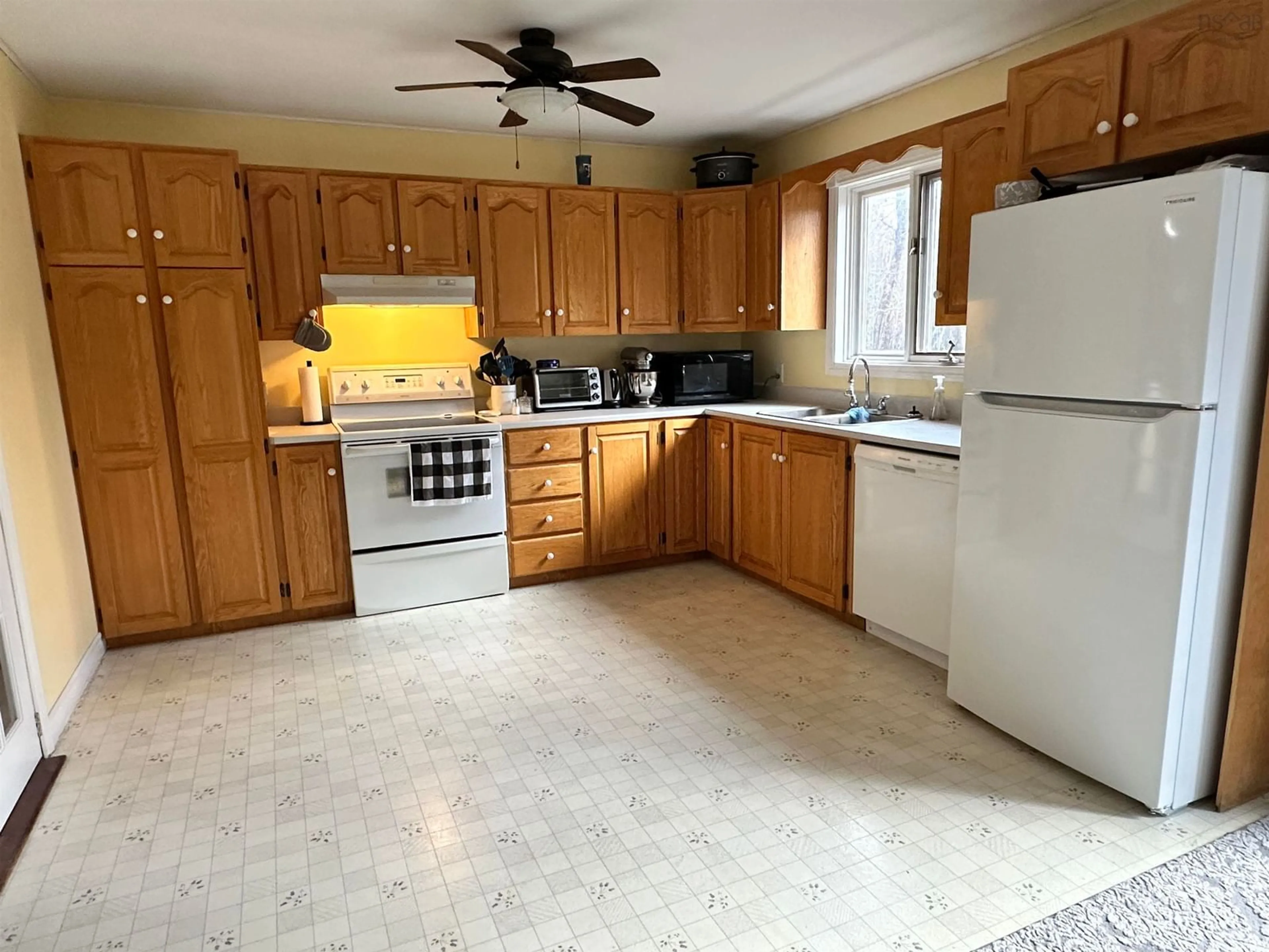 Standard kitchen, wood floors, cottage for 789 Old Port Mouton Rd, White Point Nova Scotia B0T 1K0