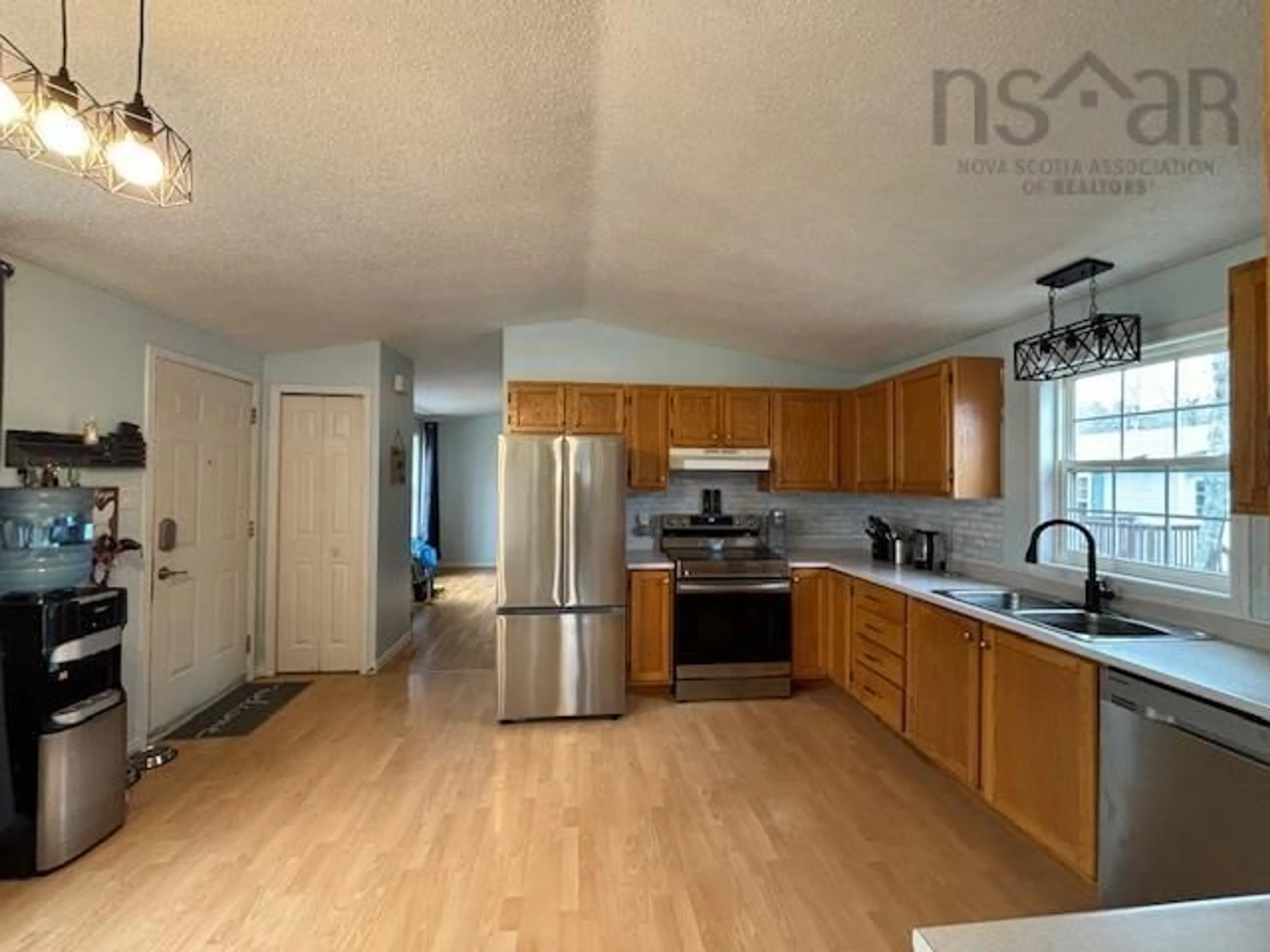 Open concept kitchen for 41 Water St, Wileville Nova Scotia B4V 5K1