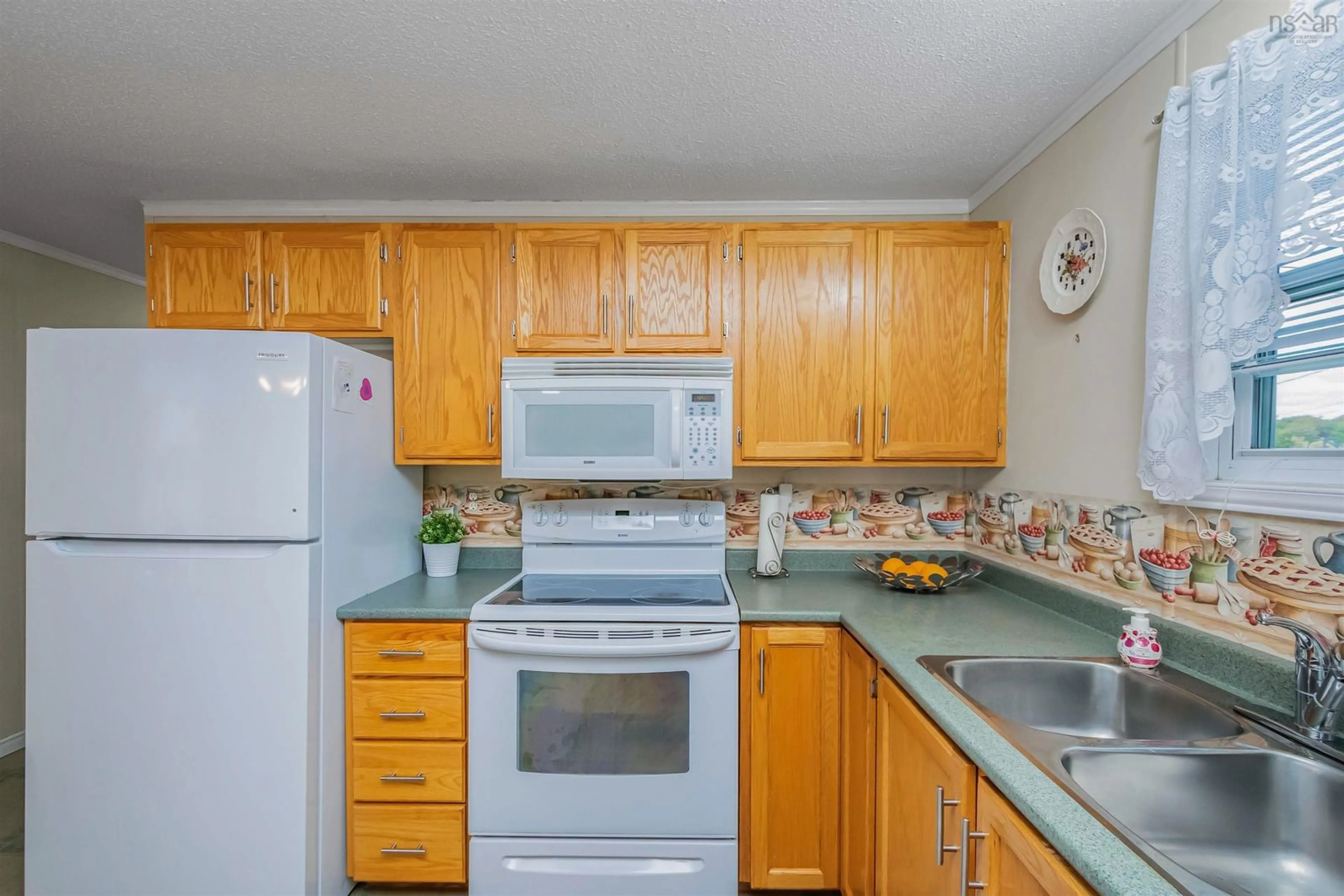 Standard kitchen, wood floors, cottage for 7 Heather St, Middle Sackville Nova Scotia B4E 1C9