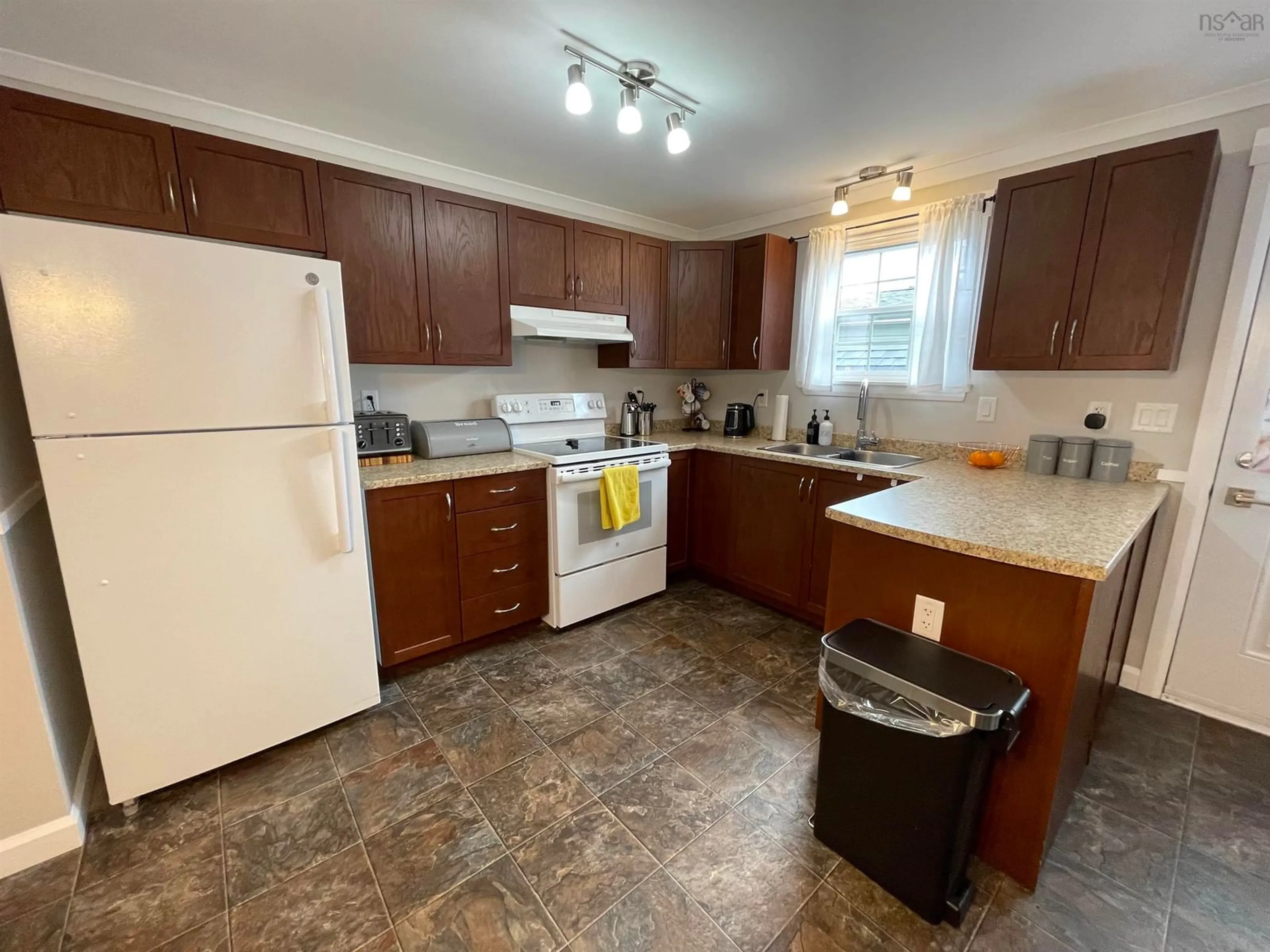 Standard kitchen, wood floors, cottage for 5 Sea Glass Dr, Simms Settlement Nova Scotia B0J 1T0