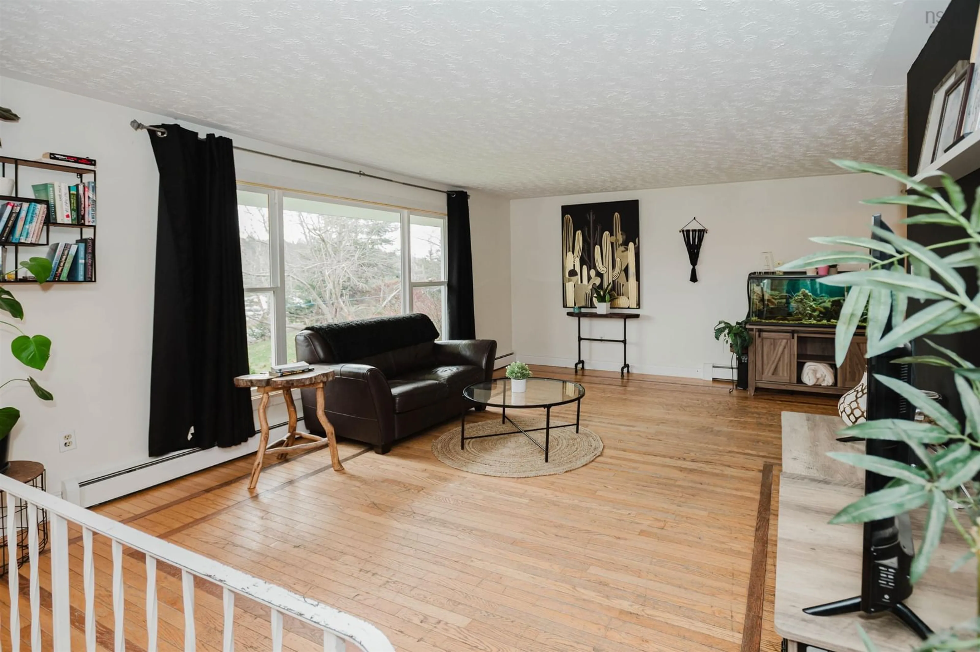 Living room, wood floors for 799 Terence Bay Road, Terence Bay Nova Scotia B3T 1X2