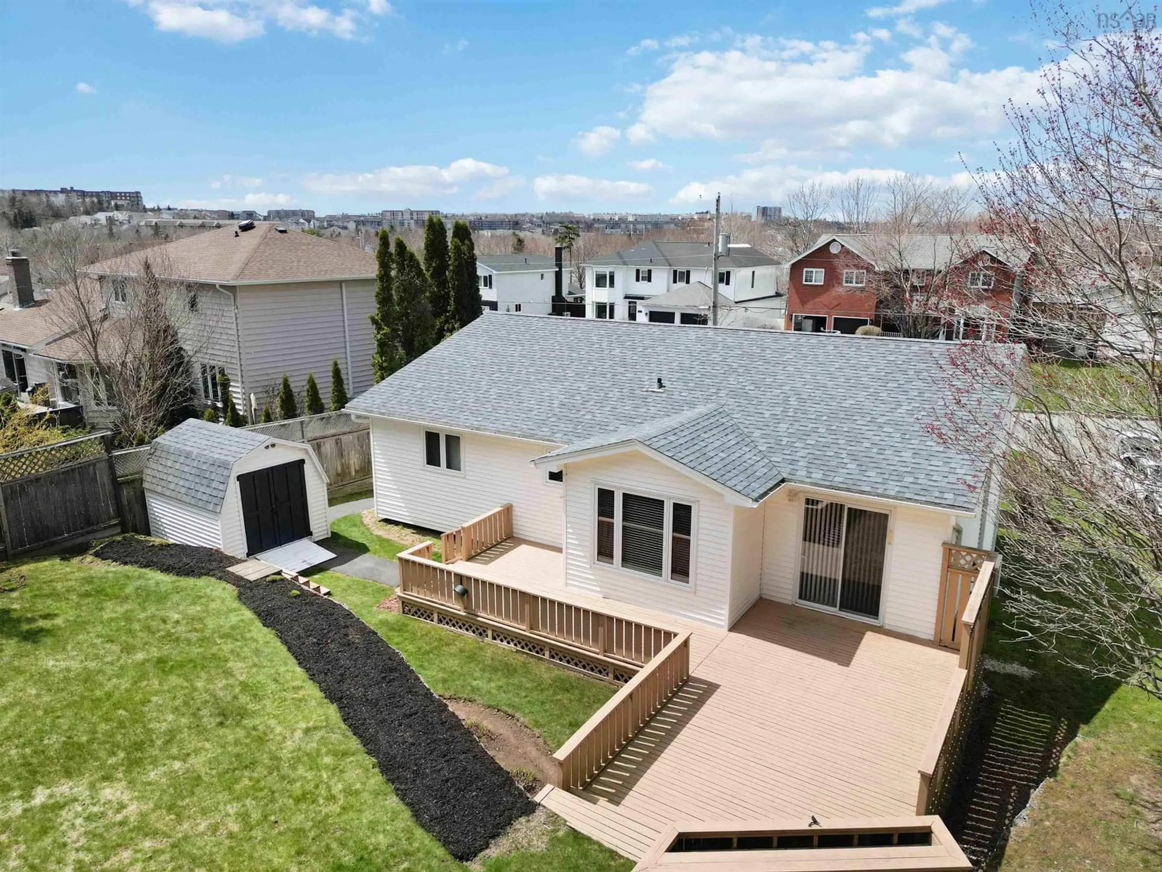 Frontside or backside of a home, the fenced backyard for 31 Barry Allen Drive, Dartmouth Nova Scotia B2W 5Z9