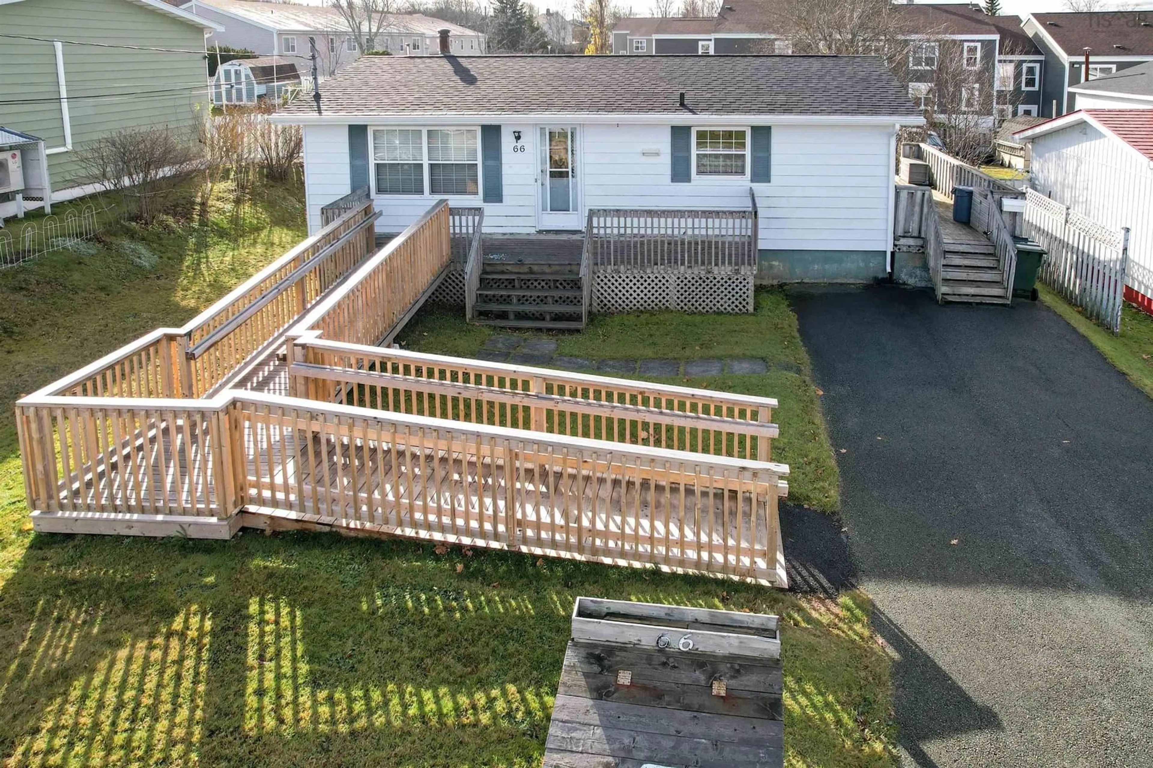 Frontside or backside of a home, the fenced backyard for 66 Tillock Dr, Sydney Nova Scotia B1P 6R1