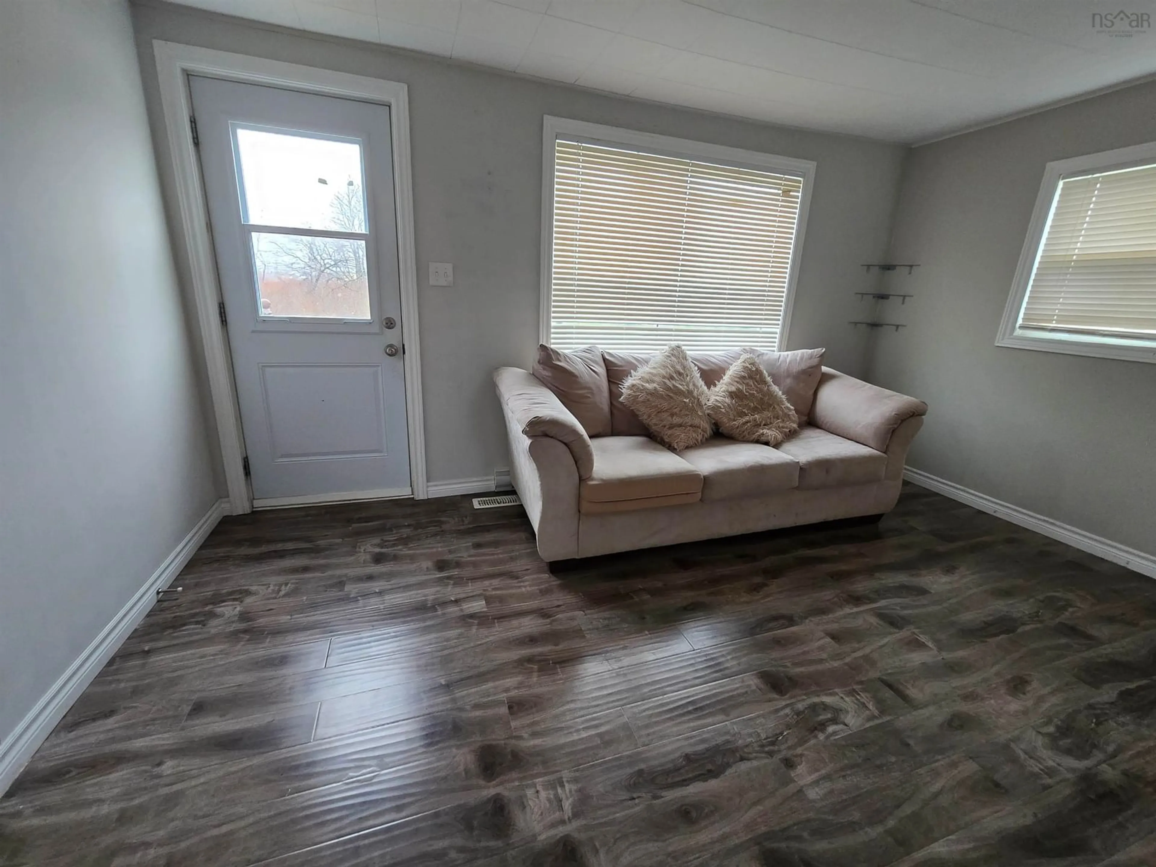 A pic of a room, wood floors for 14 Dundee Dr, Sydney Nova Scotia B1P 5V1