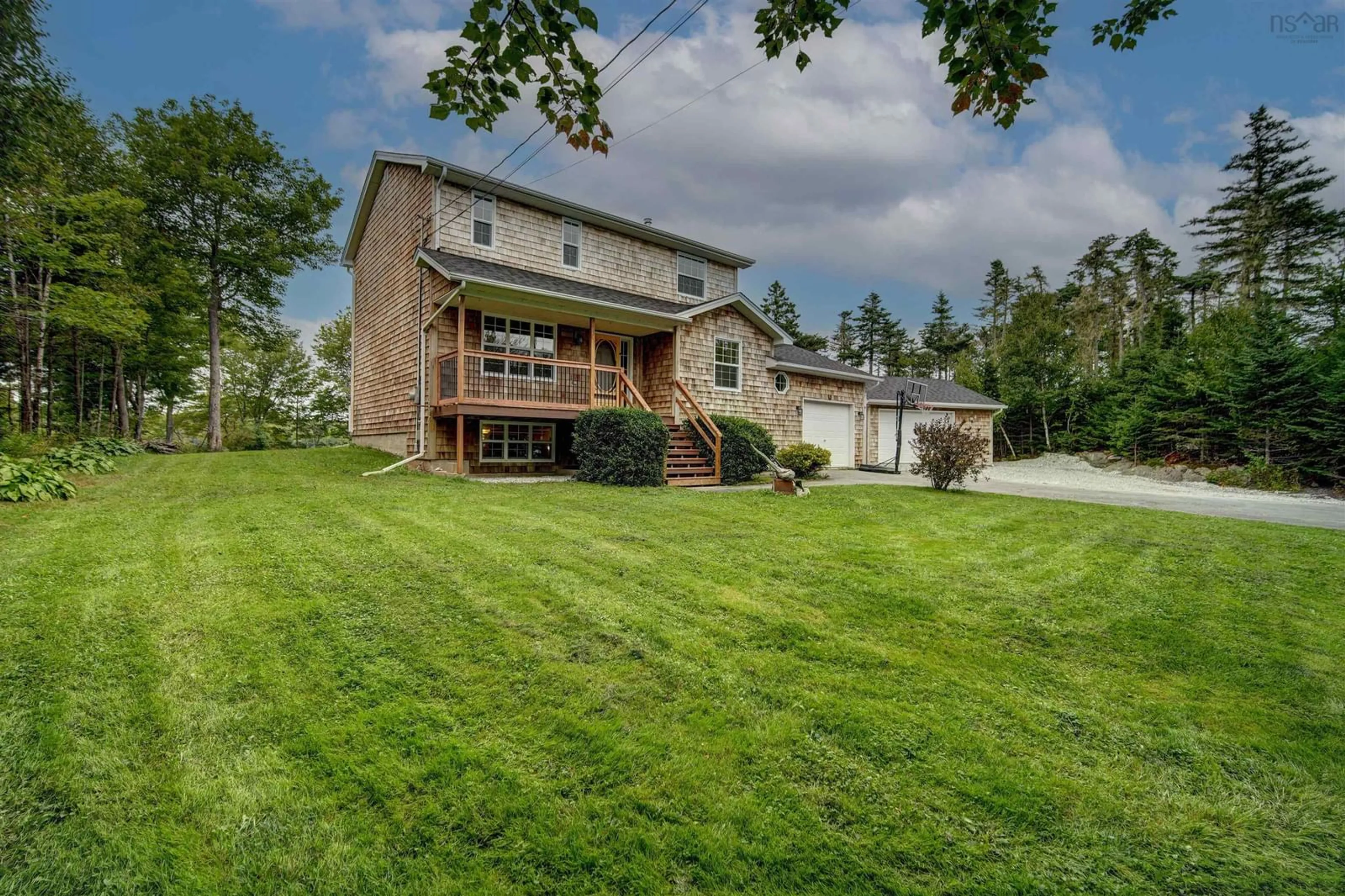 Frontside or backside of a home, the fenced backyard for 35 Prospect River Crt, Hatchet Lake Nova Scotia B3T 1R8