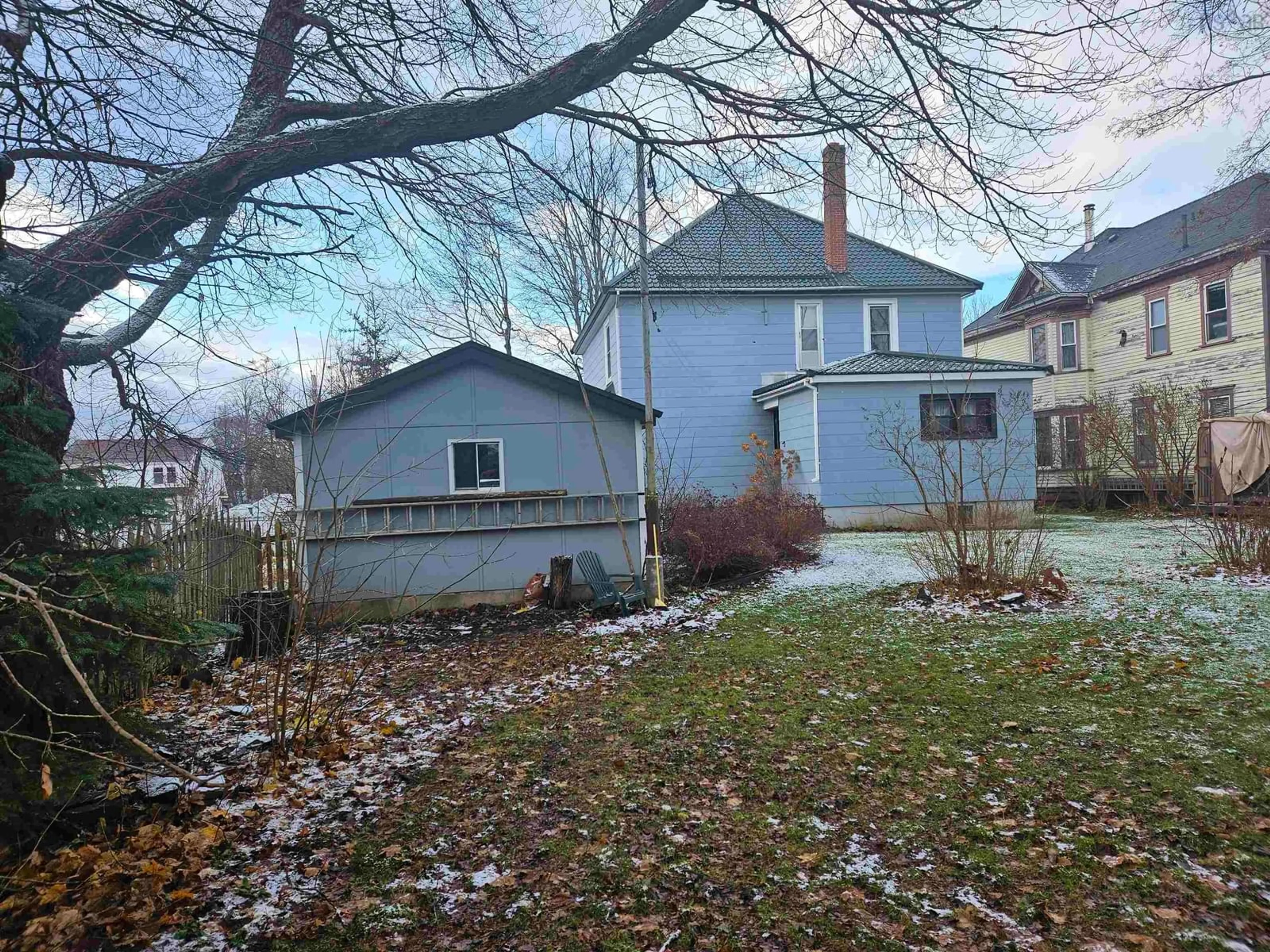 Frontside or backside of a home, the fenced backyard for 10 Melrose St, Amherst Nova Scotia B4H 3M9