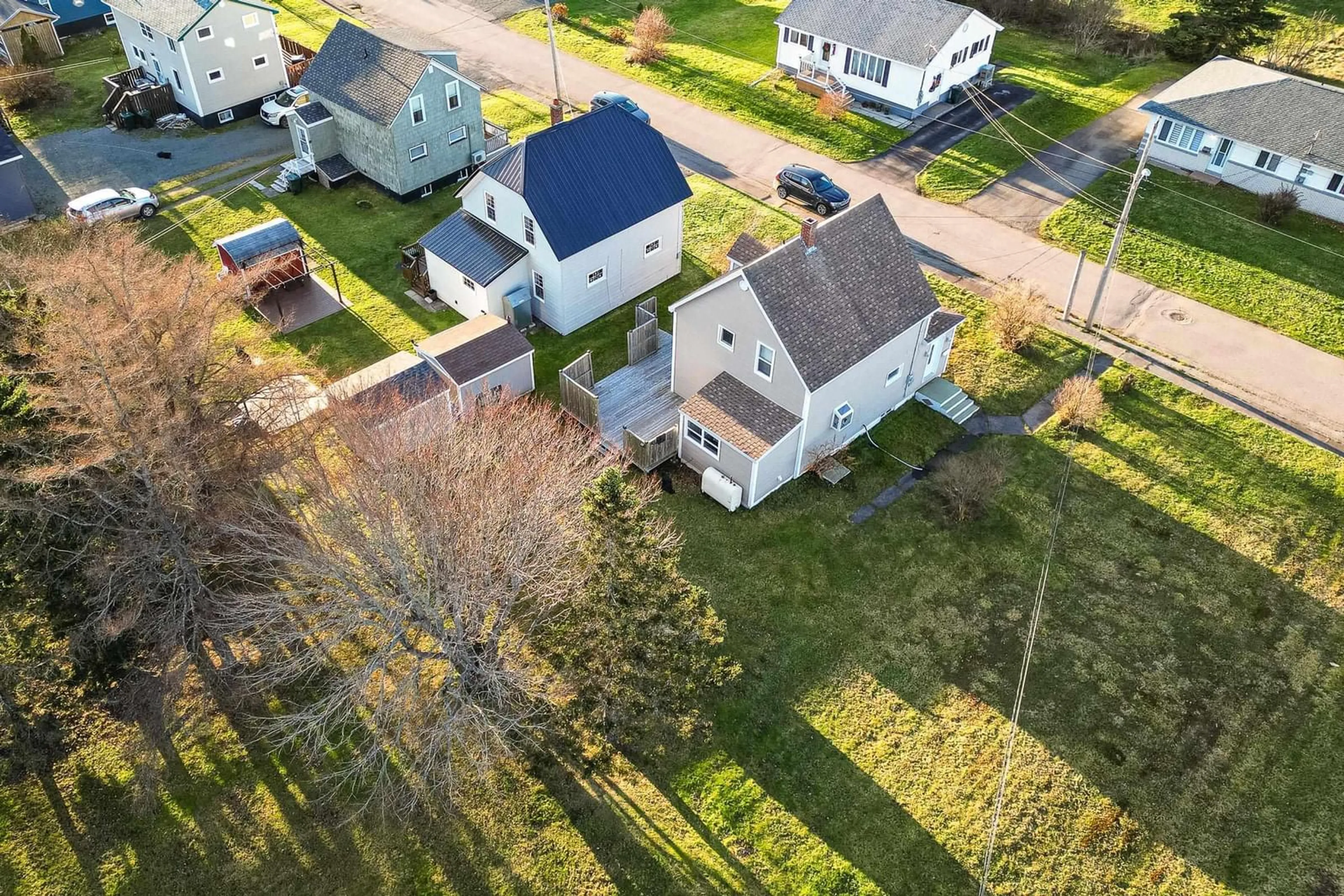 Frontside or backside of a home, the fenced backyard for 119 Forest Street, Glace Bay Nova Scotia B1A 1G8