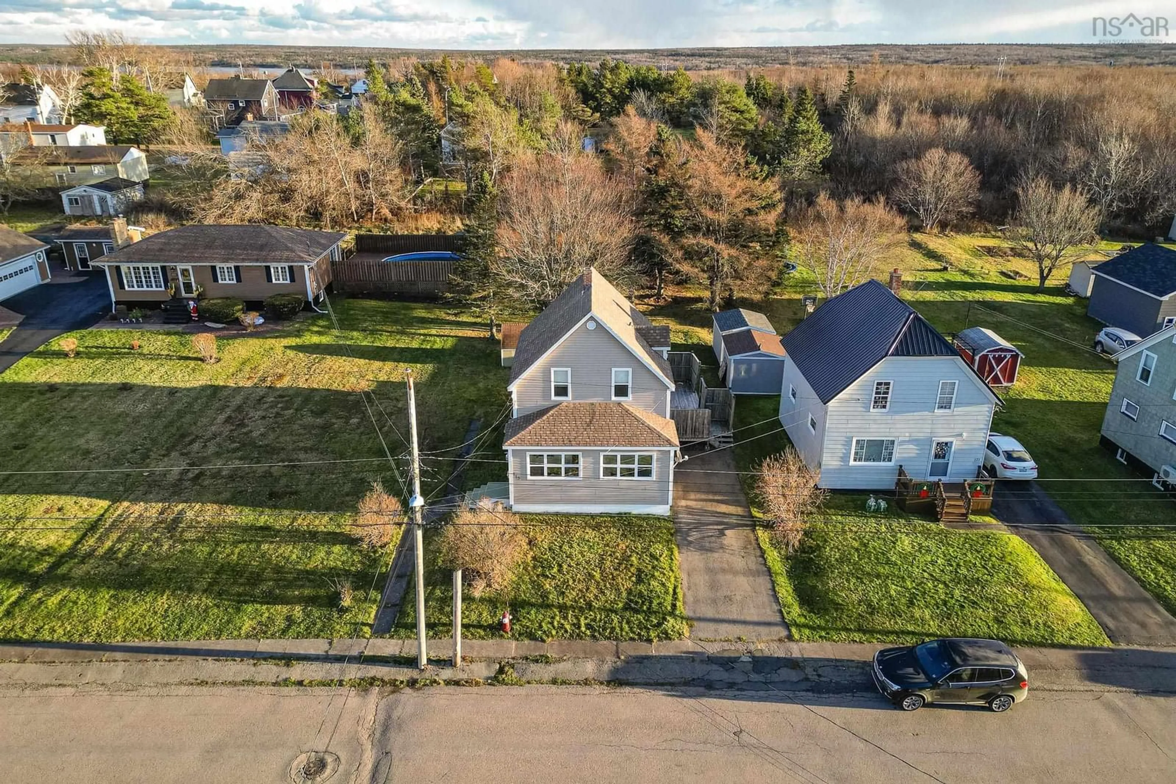 A pic from exterior of the house or condo, the fenced backyard for 119 Forest Street, Glace Bay Nova Scotia B1A 1G8