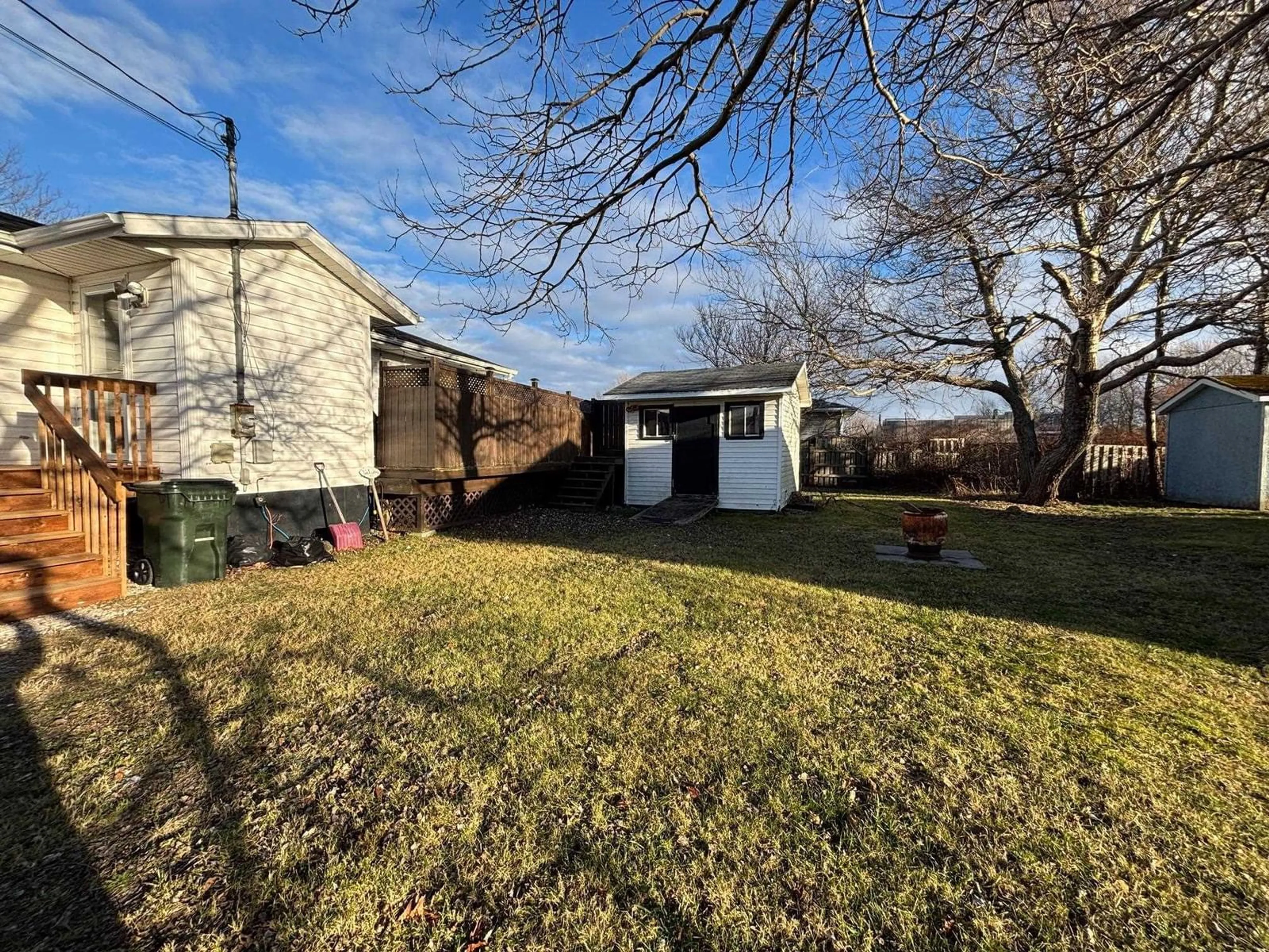 Frontside or backside of a home, the fenced backyard for 454 Gerrard St, New Waterford Nova Scotia B1H 4J1