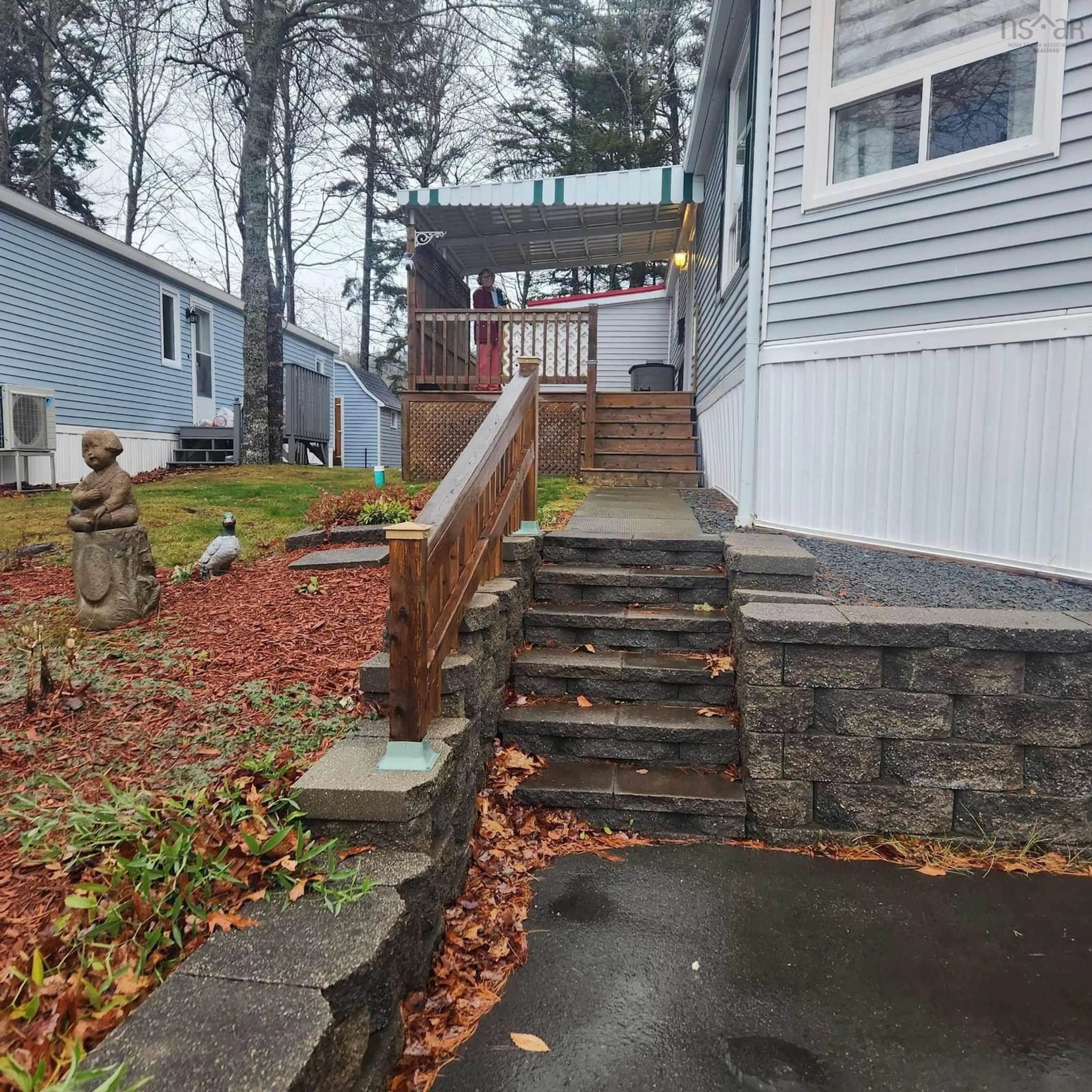 Frontside or backside of a home, the fenced backyard for 24 Autumn St, Bridgewater Nova Scotia B4V 3Z9