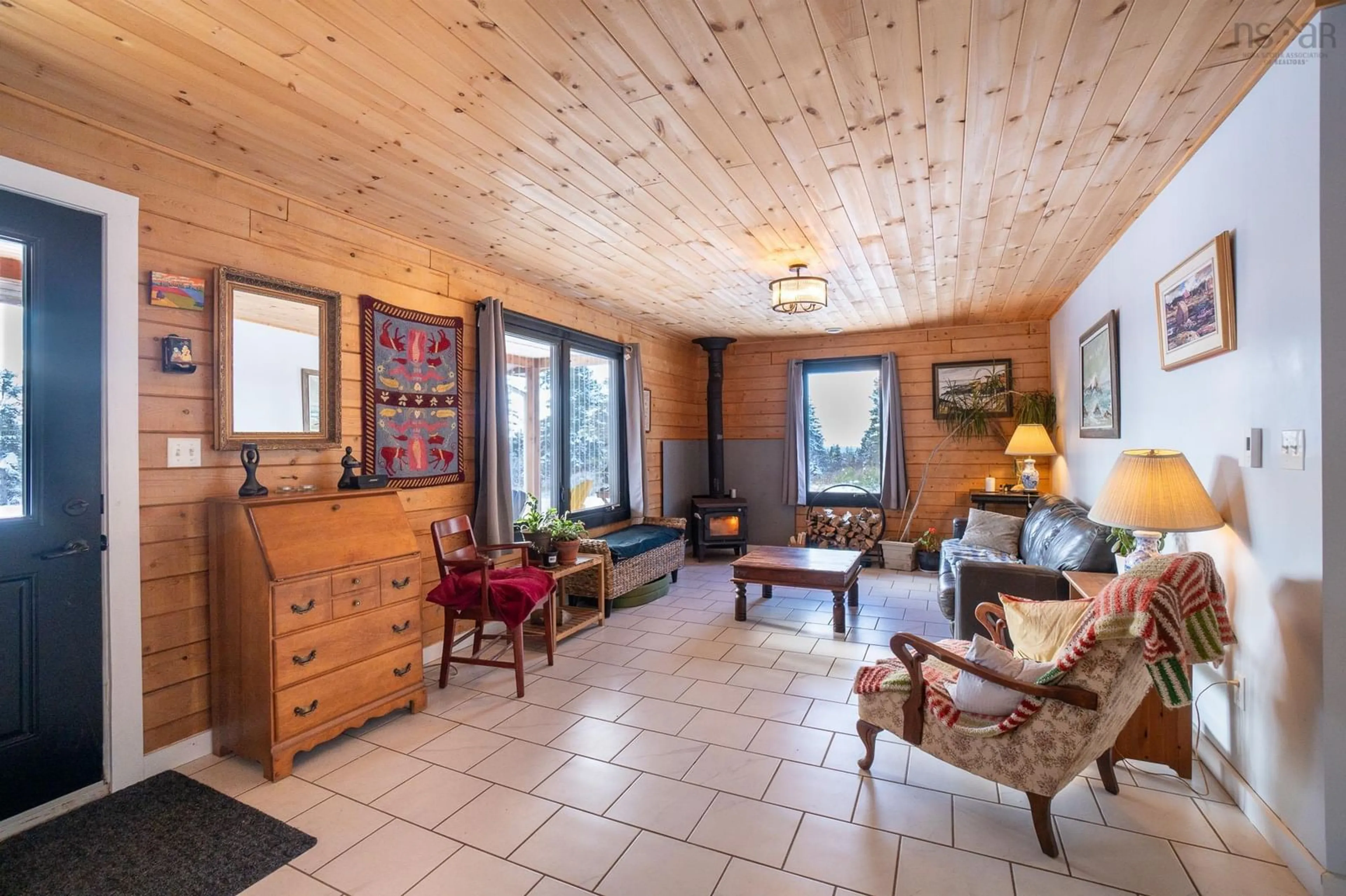 Living room, wood floors for 4591 358 Hwy, South Scots Bay Nova Scotia B0P 1H0