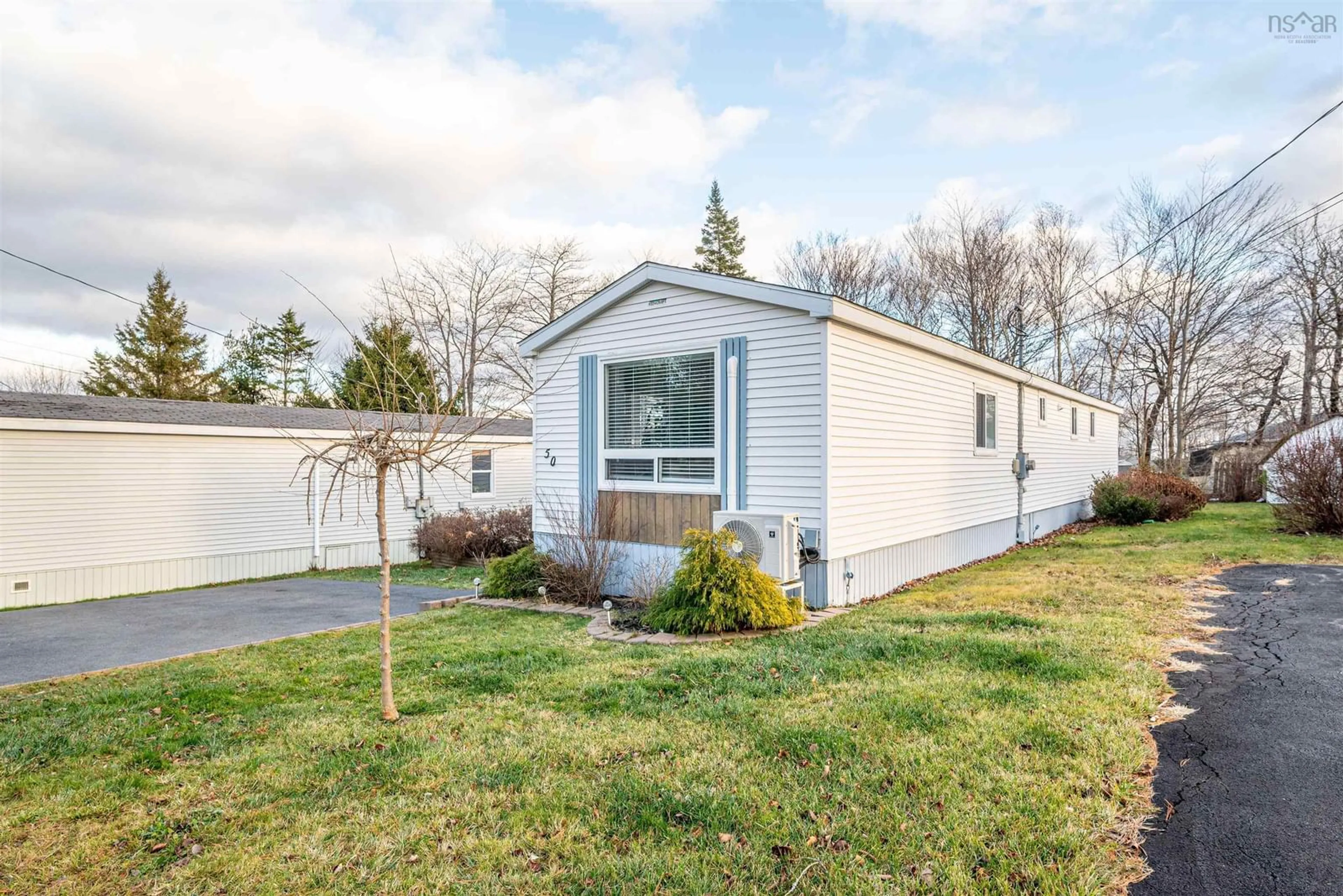 Home with vinyl exterior material for 50 Wagner Drive, Middle Sackville Nova Scotia B4E 2Z2