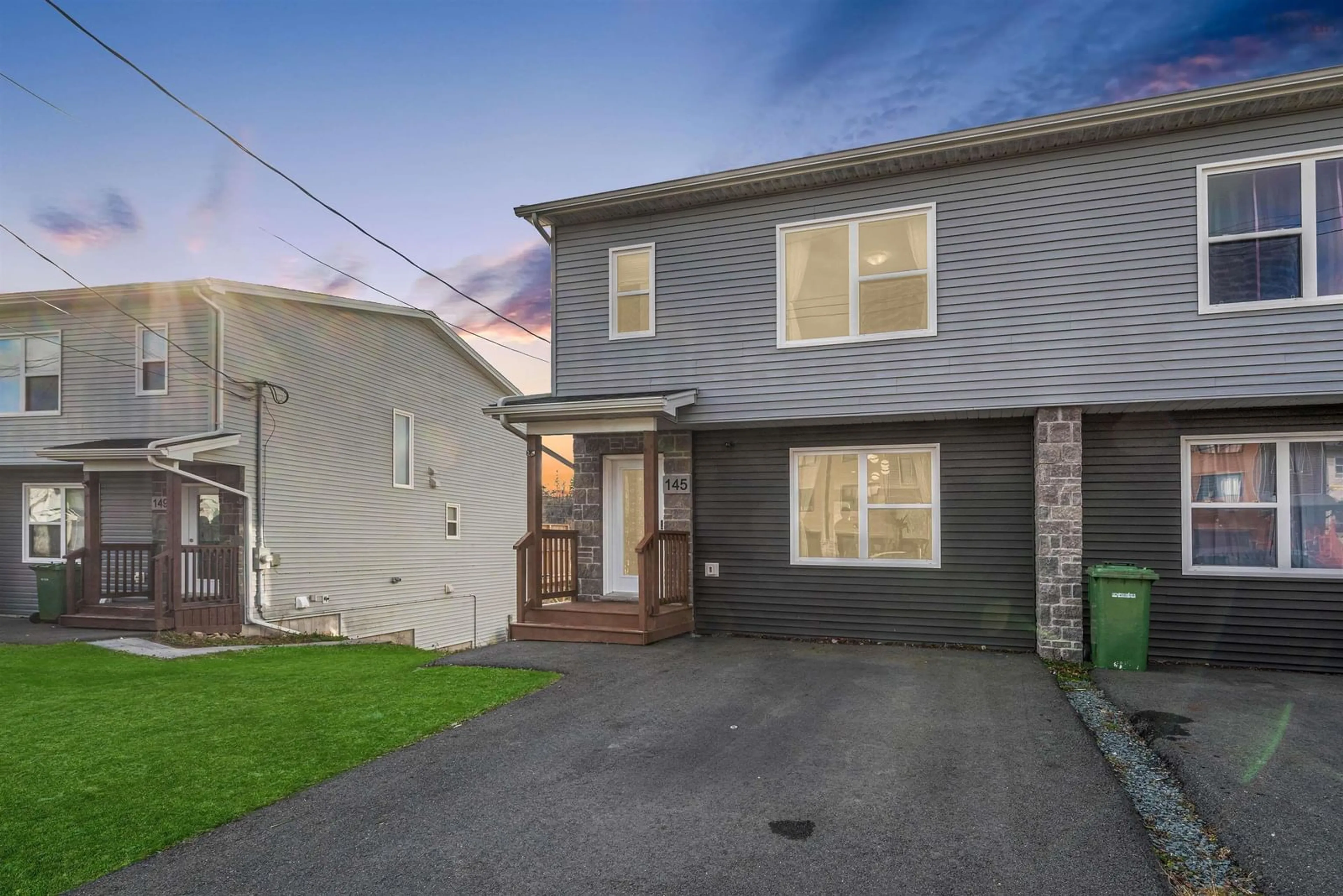 Frontside or backside of a home, the fenced backyard for 145 Honeygold Drive, Spryfield Nova Scotia B3R 0G3