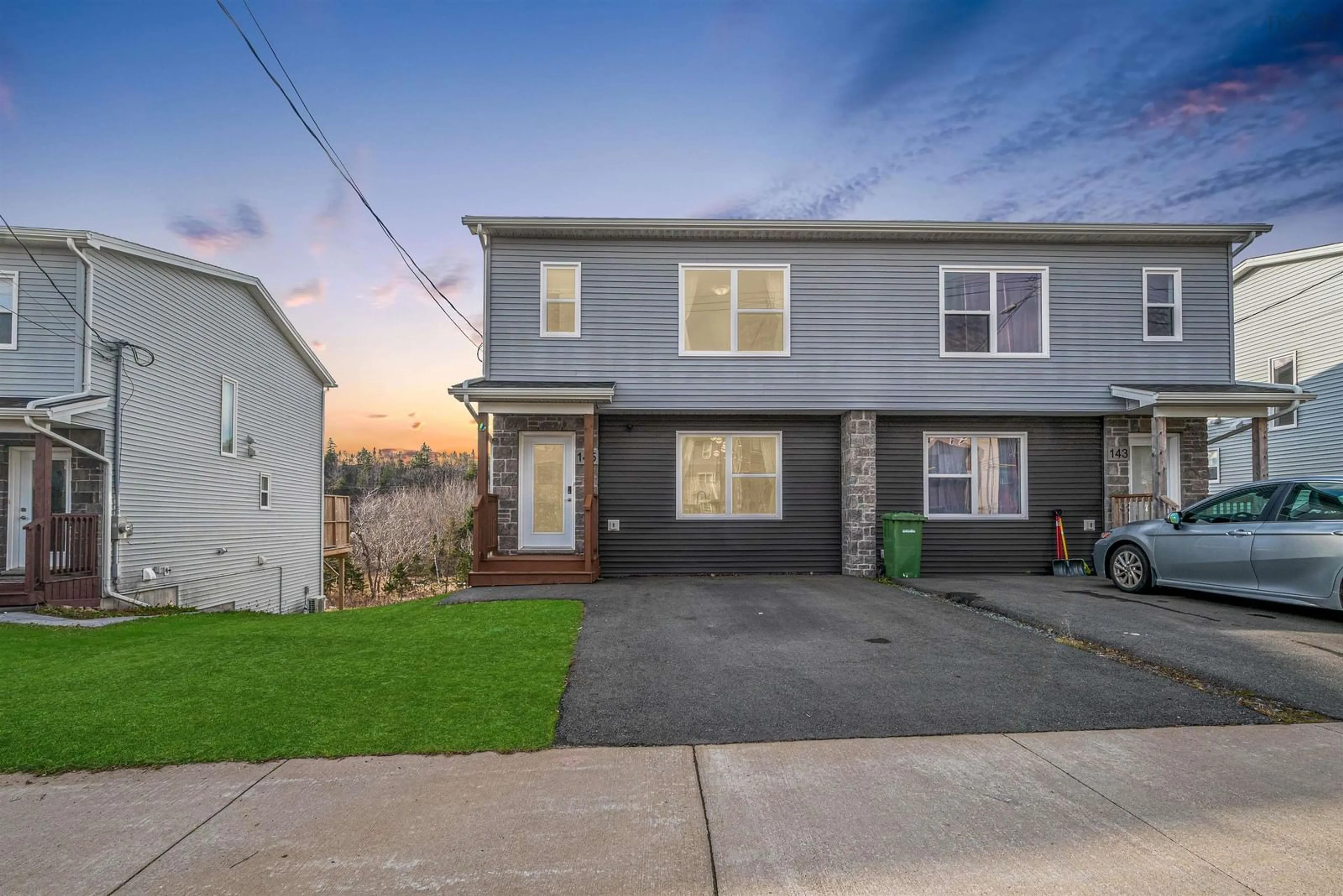 Frontside or backside of a home, the fenced backyard for 145 Honeygold Drive, Spryfield Nova Scotia B3R 0G3