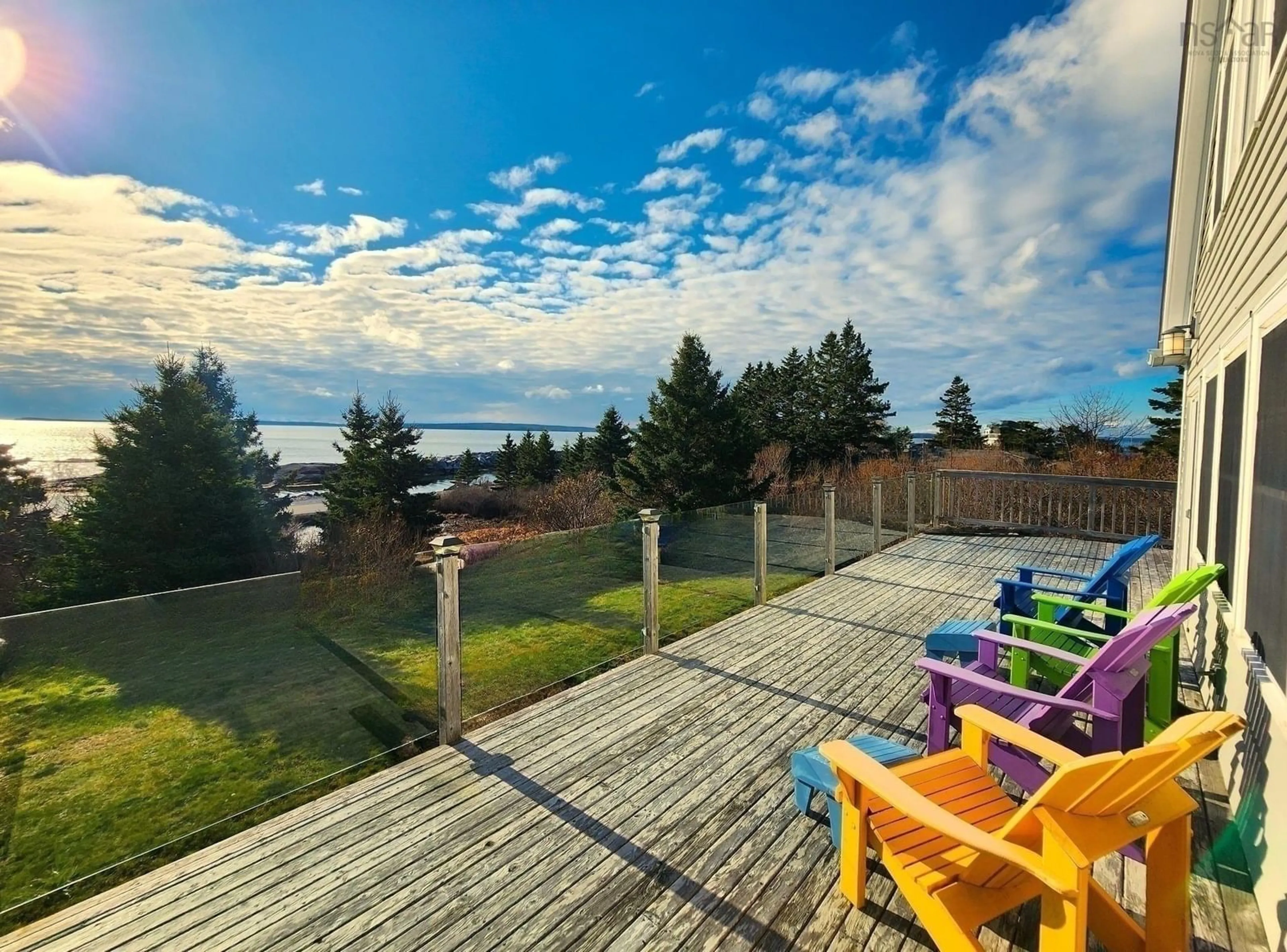 Patio, the fenced backyard for 157 The Point Rd, Blue Rocks Nova Scotia B0J 2C0