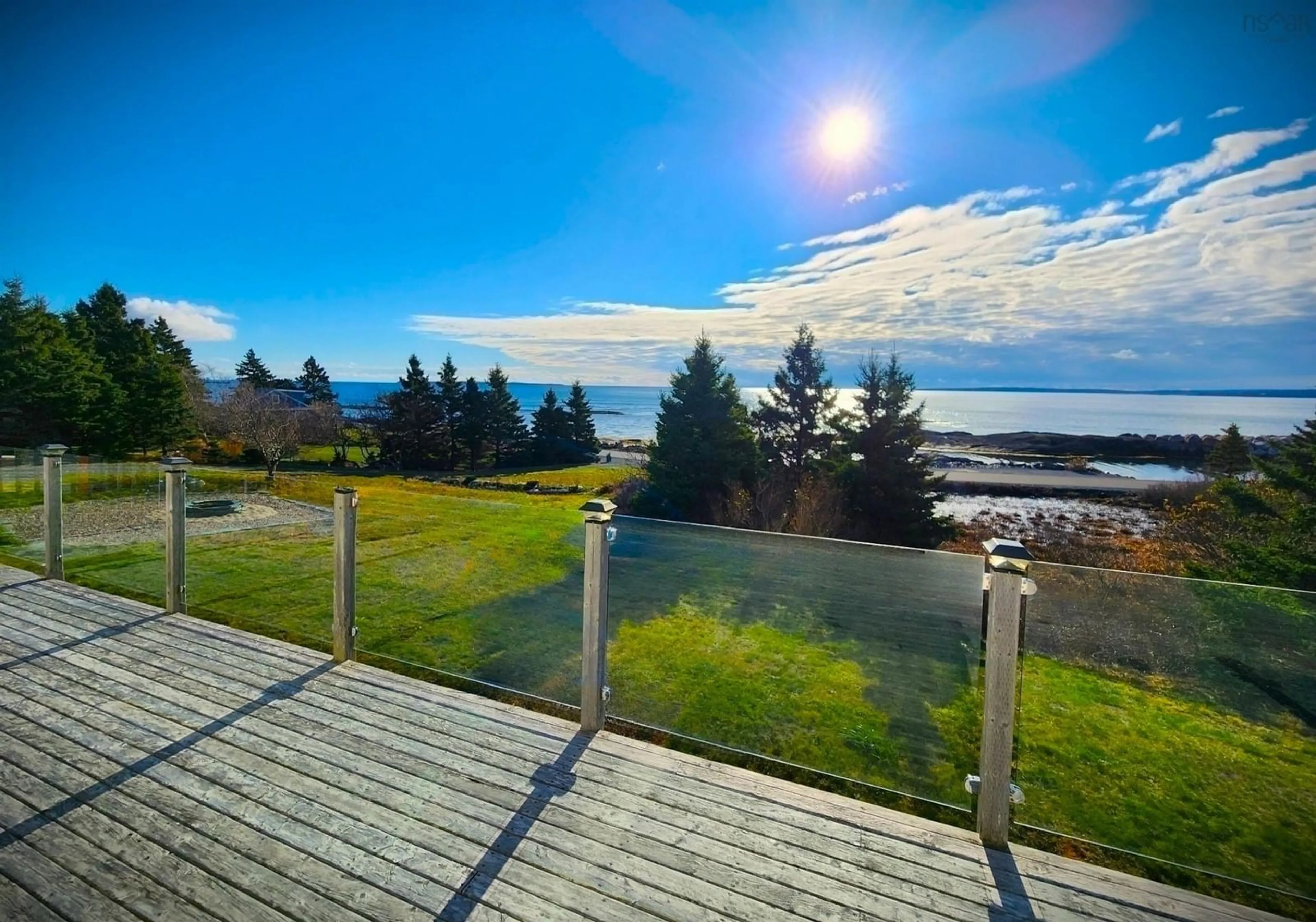 Patio, the fenced backyard for 157 The Point Rd, Blue Rocks Nova Scotia B0J 2C0