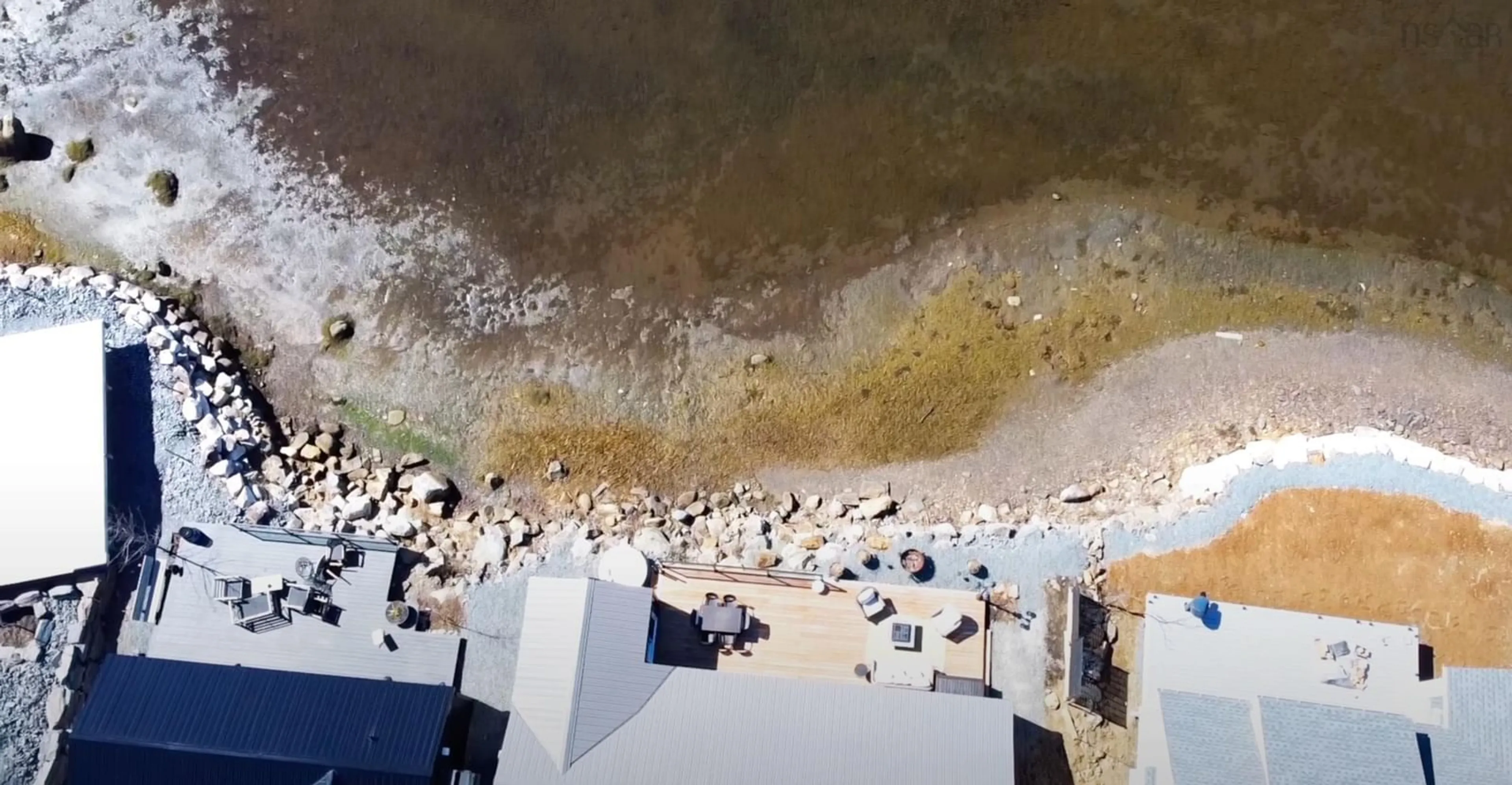 A pic from outside/outdoor area/front of a property/back of a property/a pic from drone, water/lake/river/ocean view for 693 Masons Beach Rd #Unit 7, First South Nova Scotia B0J 2C0