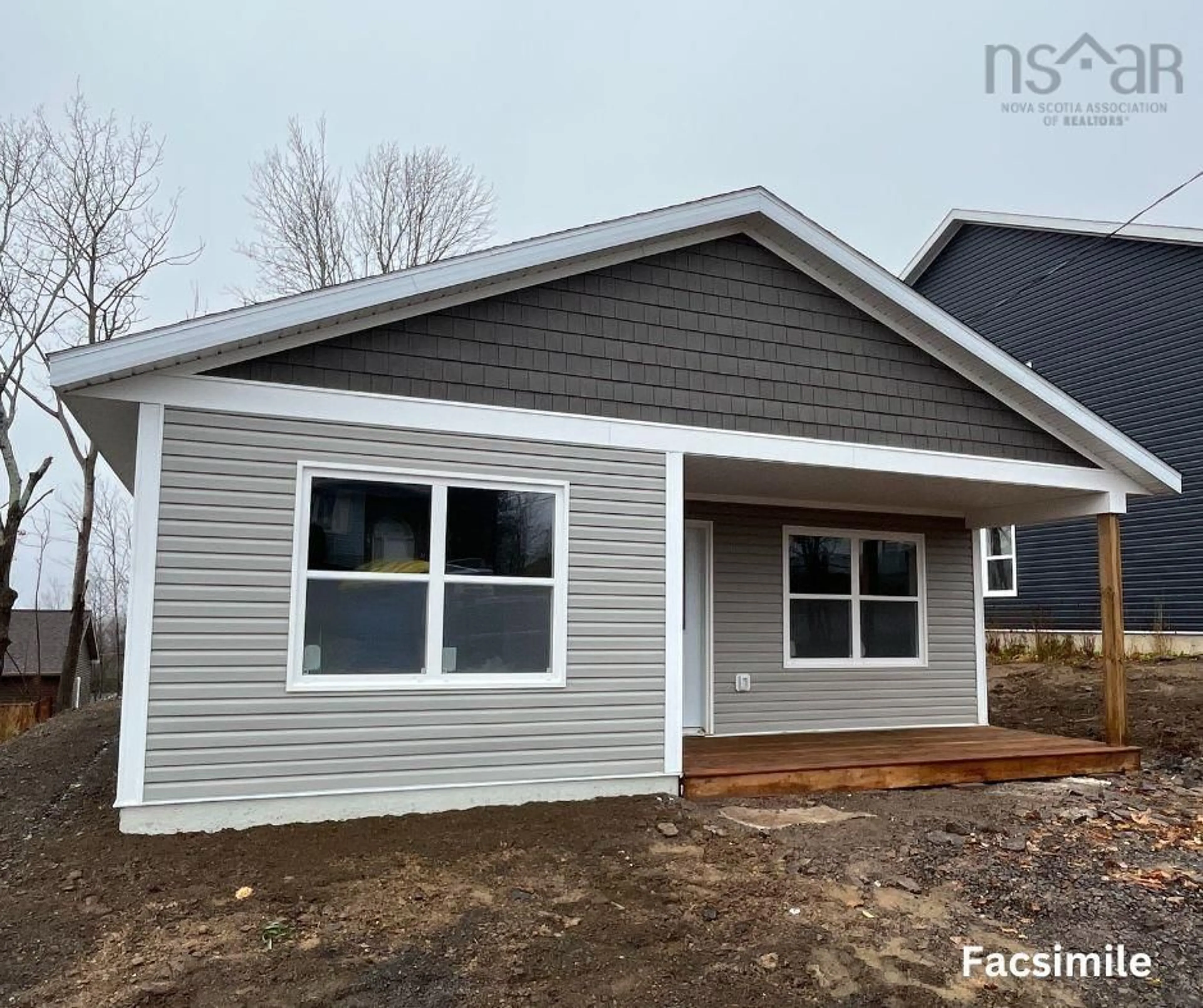 Home with vinyl exterior material, street for 12 Fleming St, Amherst Nova Scotia B4H 0C3