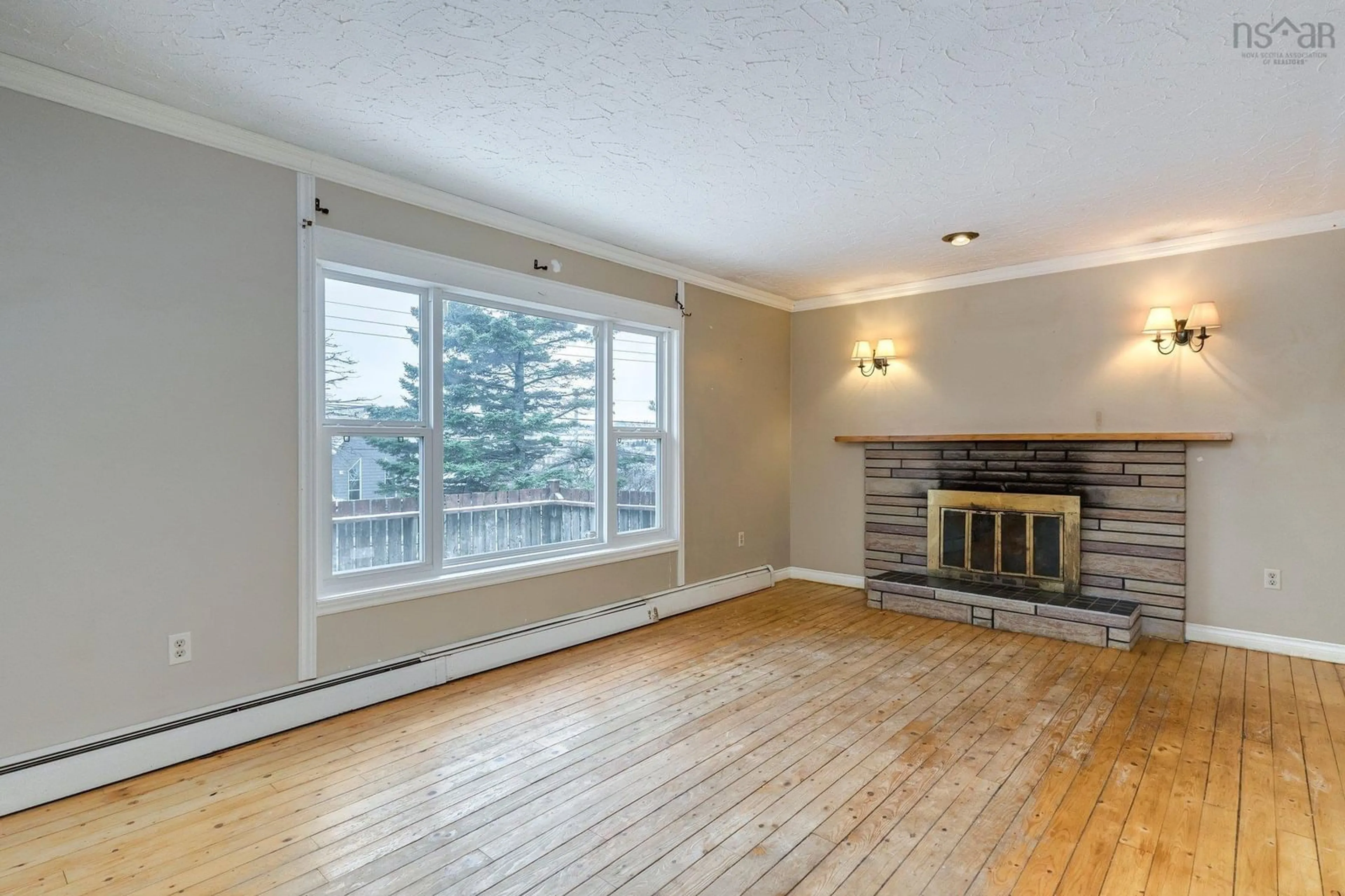 Living room with furniture, wood/laminate floor for 18 Bissett Rd, Cole Harbour Nova Scotia B2V 2T1