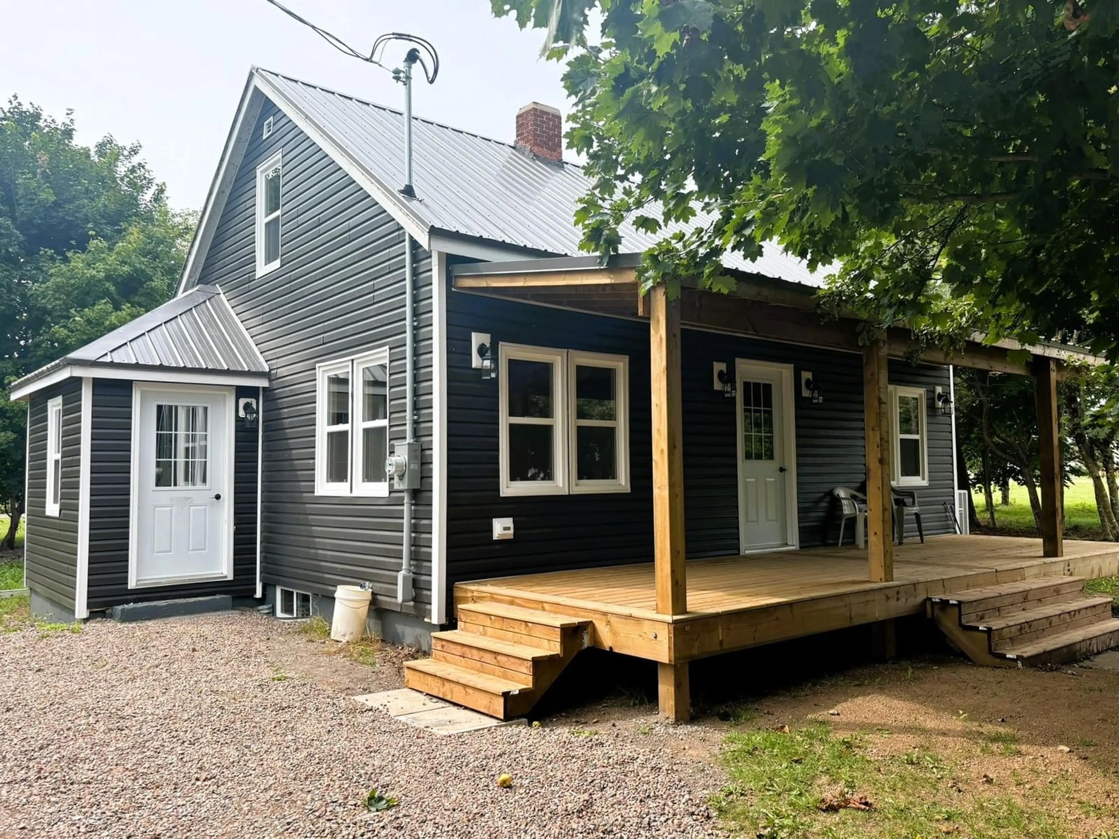 Home with vinyl exterior material, street for 15 Stanley St, Parrsboro Nova Scotia B0M 1S0