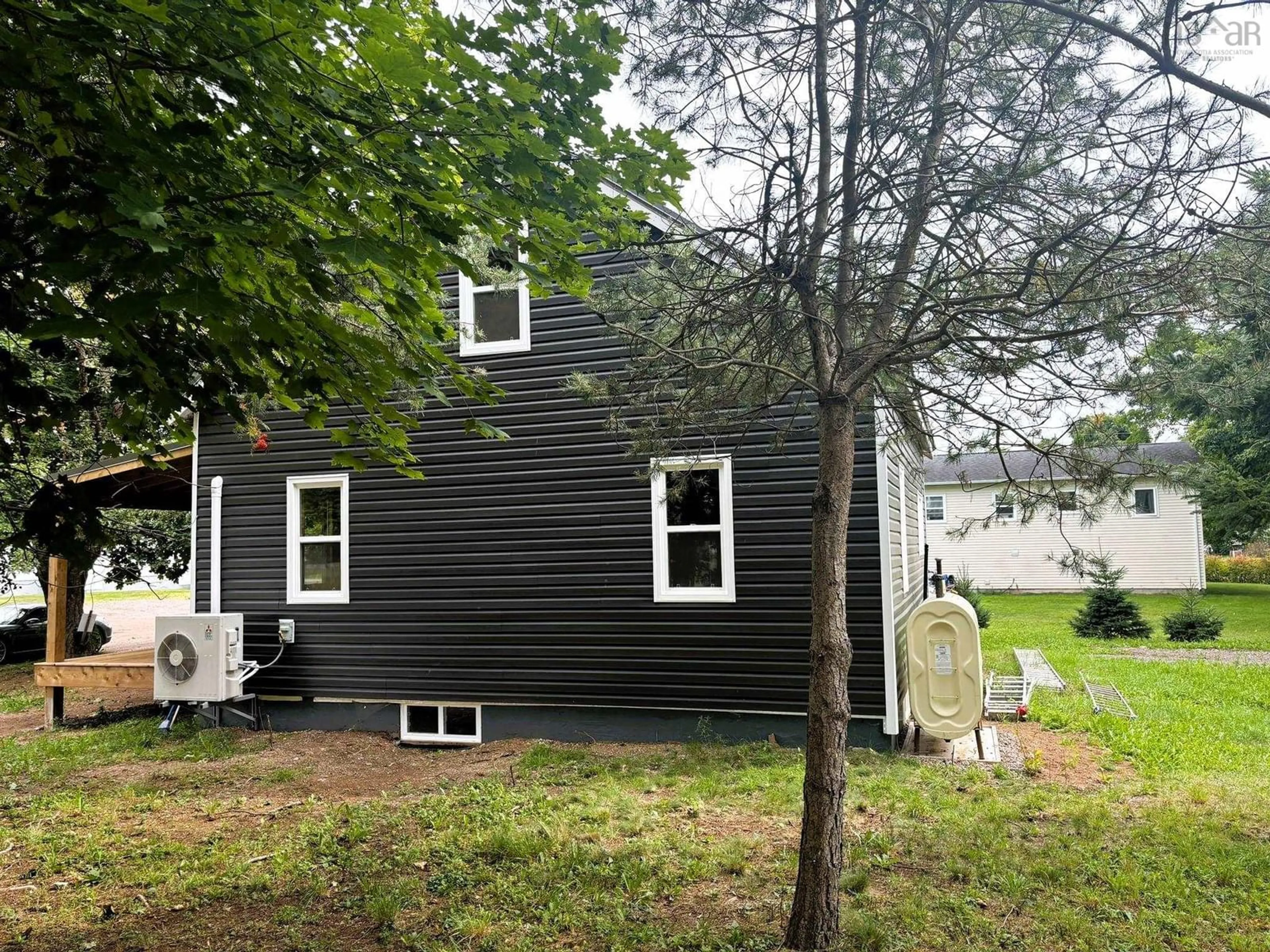 Home with vinyl exterior material, street for 15 Stanley St, Parrsboro Nova Scotia B0M 1S0