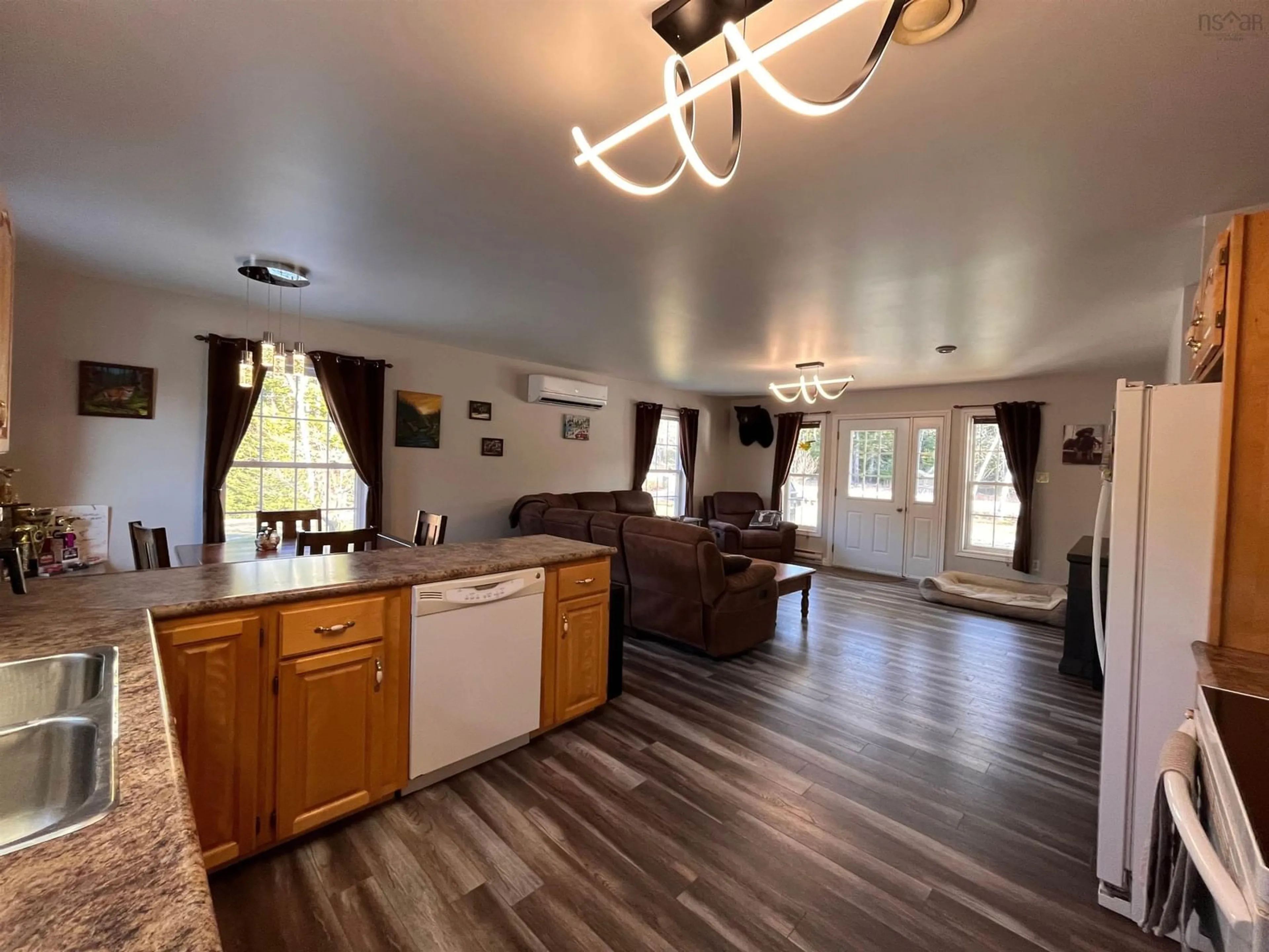 Open concept kitchen, wood/laminate floor for 835 Highway 203, Kemptville Nova Scotia B5A 5R3