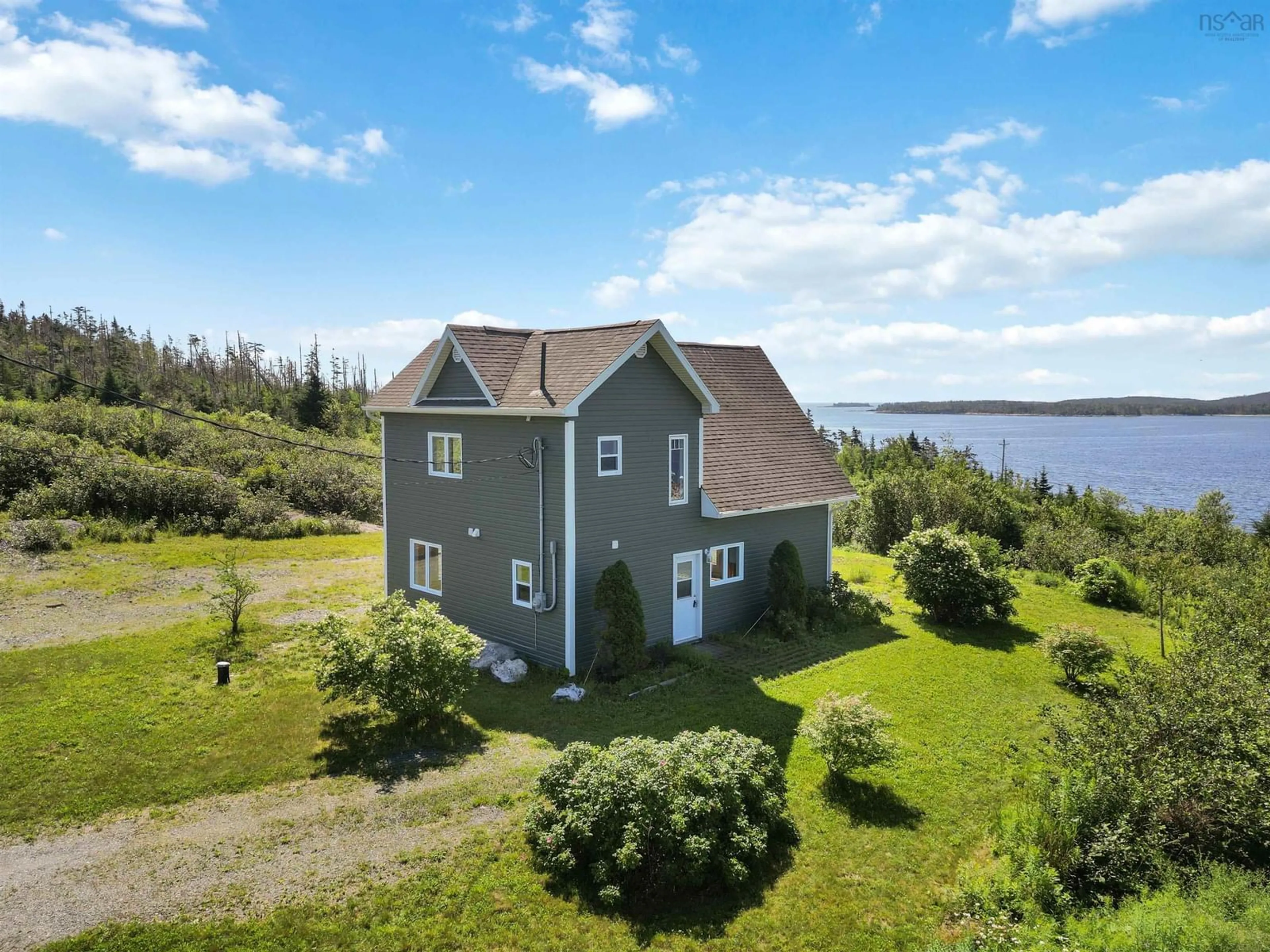 A pic from outside/outdoor area/front of a property/back of a property/a pic from drone, water/lake/river/ocean view for 45 Platinum Lane, Popes Harbour Nova Scotia B0J 3H0