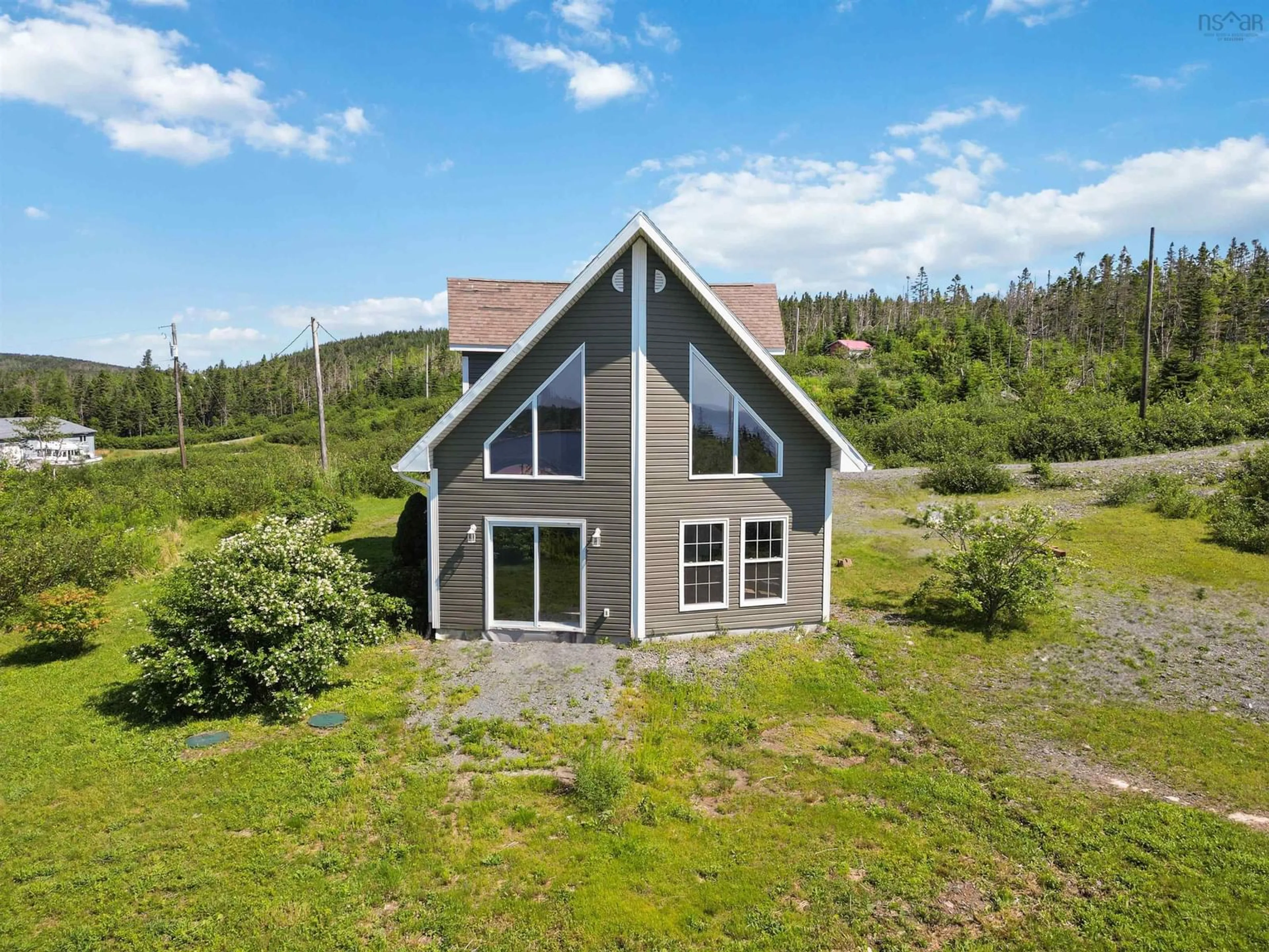 A pic from outside/outdoor area/front of a property/back of a property/a pic from drone, unknown for 45 Platinum Lane, Popes Harbour Nova Scotia B0J 3H0