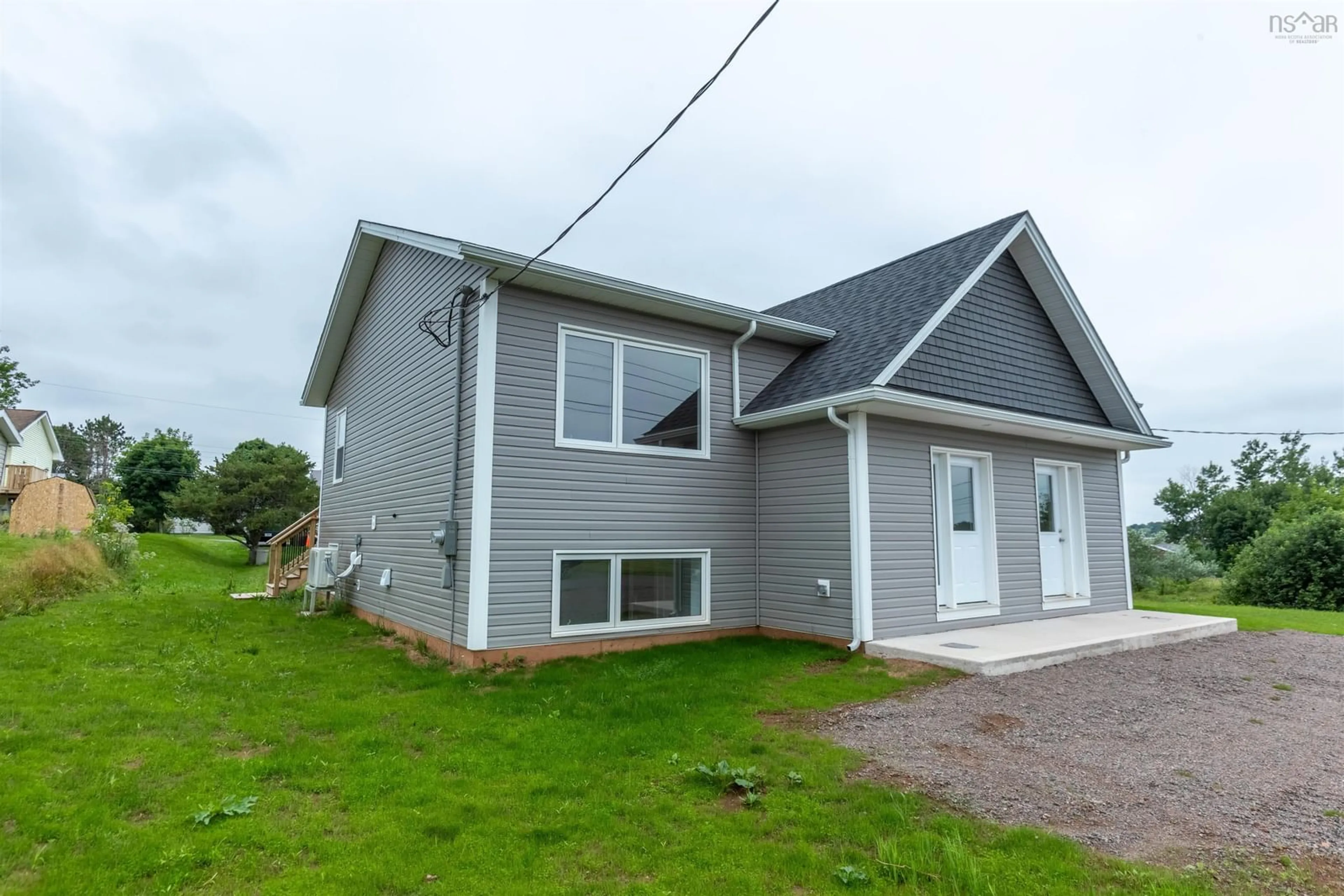 A pic from outside/outdoor area/front of a property/back of a property/a pic from drone, unknown for 4 Brown St, Amherst Nova Scotia B4H 0E3