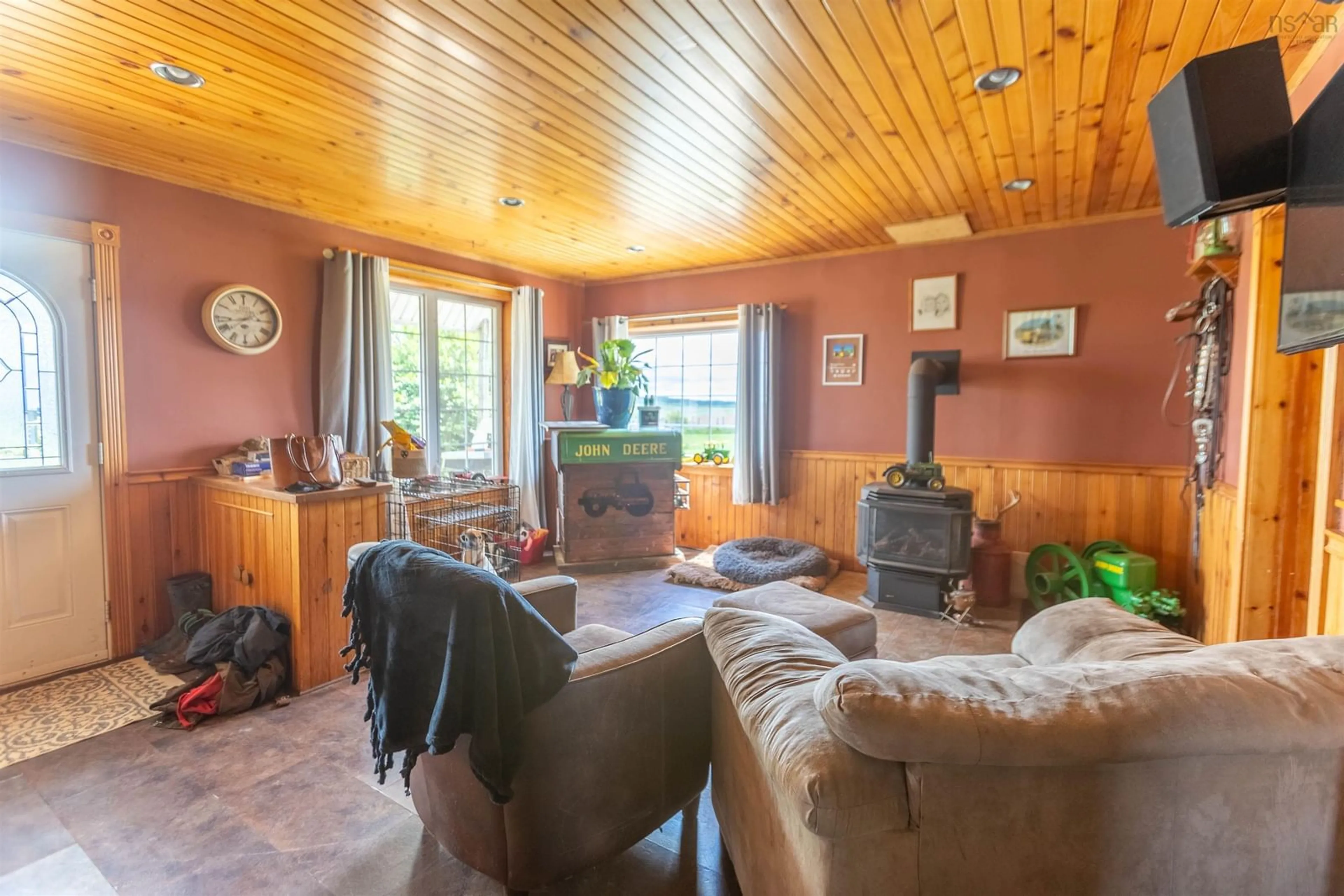 Living room with furniture, wood/laminate floor for 227 Southampton Rd, Amherst Point Nova Scotia B4H 3Y5